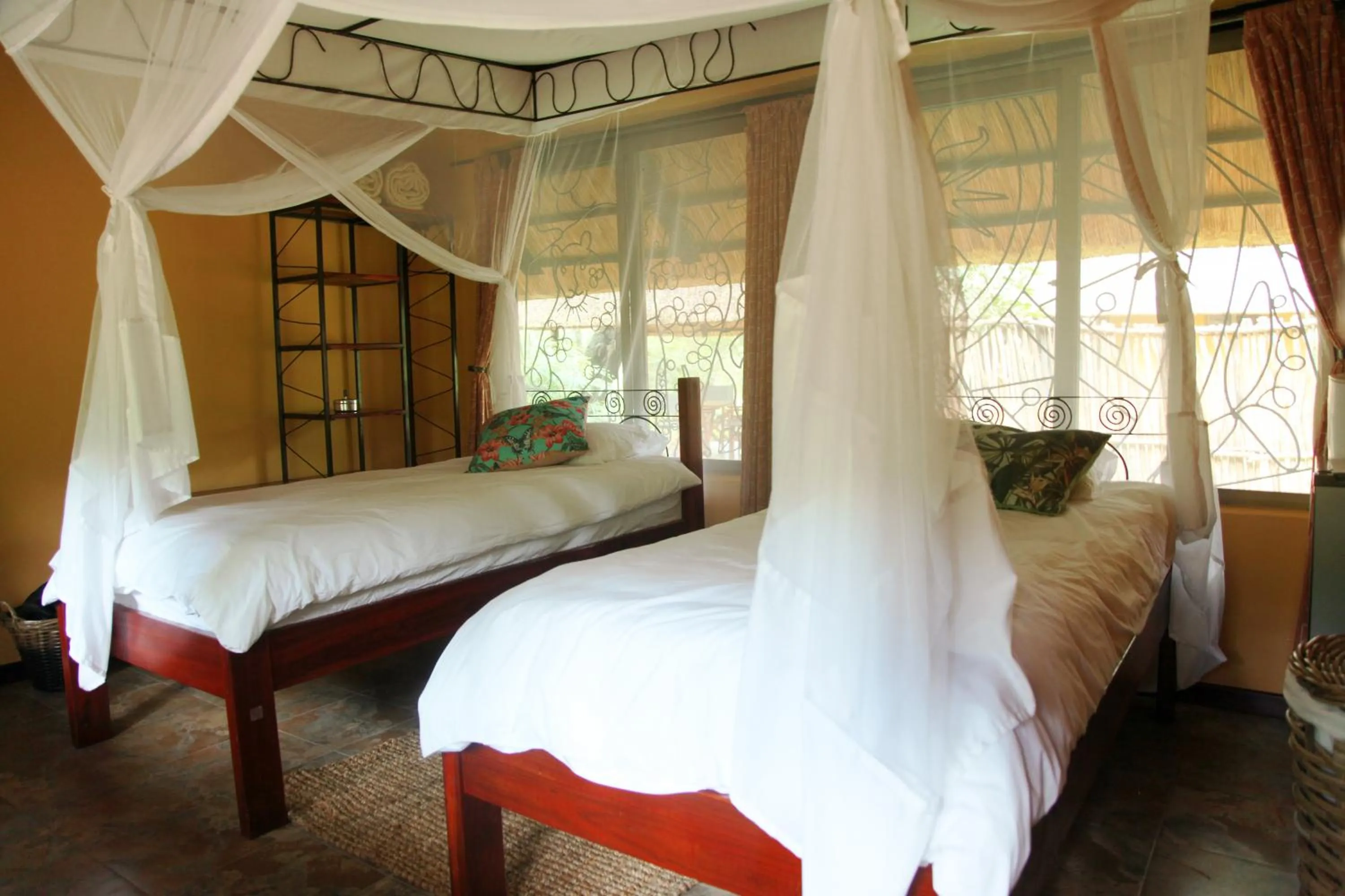 Bed in Maramba River Lodge