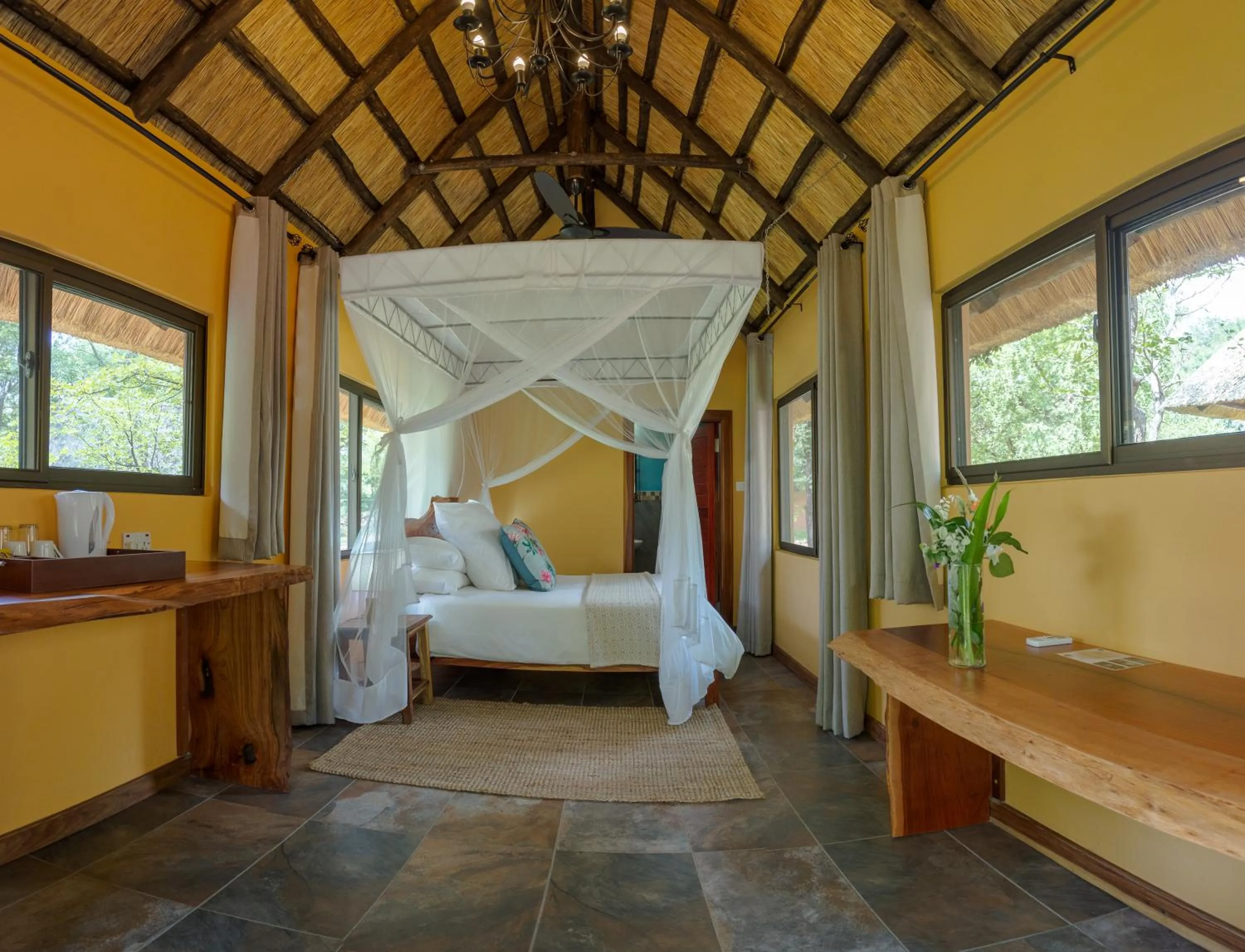 Bed in Maramba River Lodge