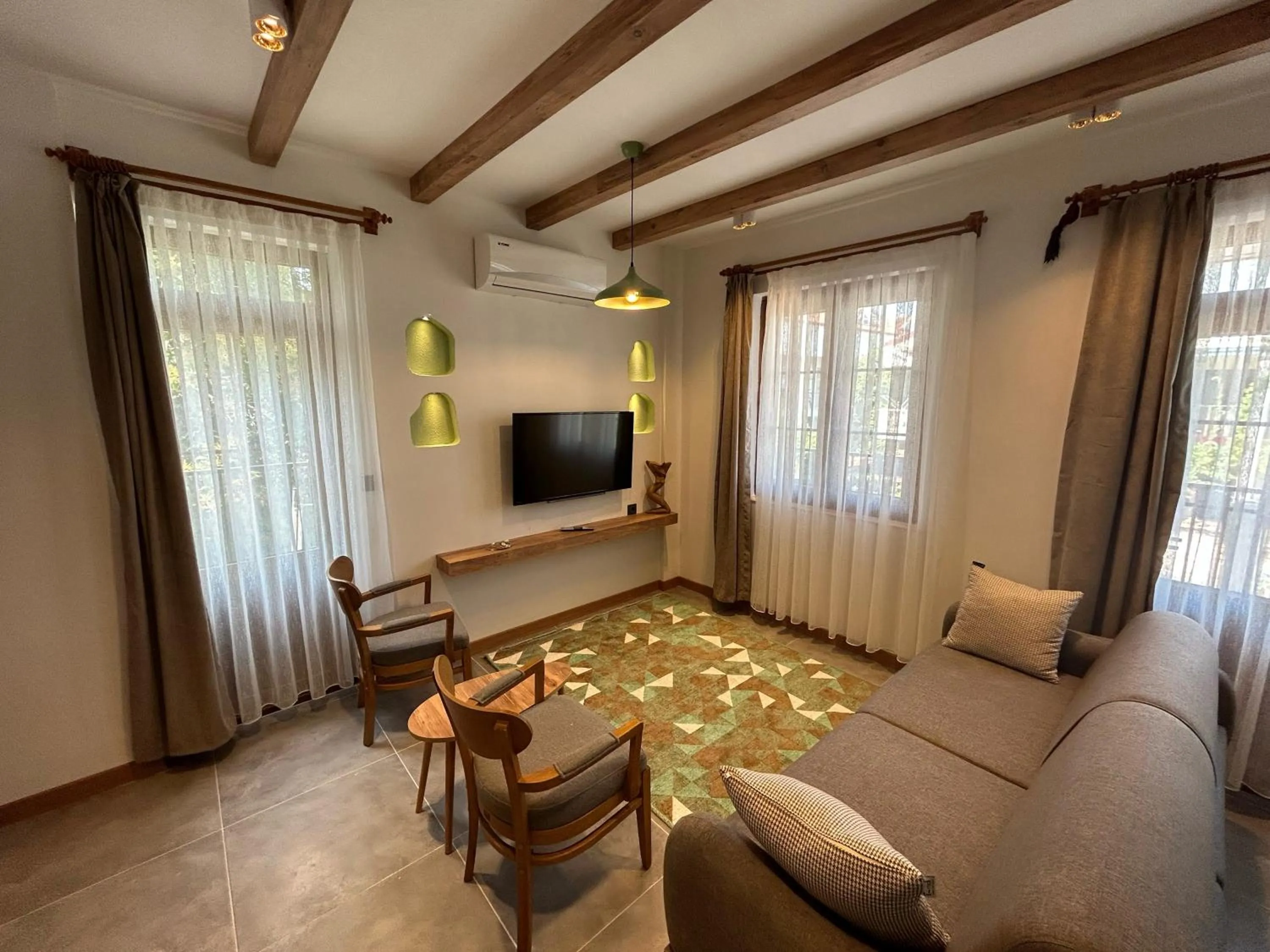 Communal lounge/ TV room in Avlu Villas & Apartments