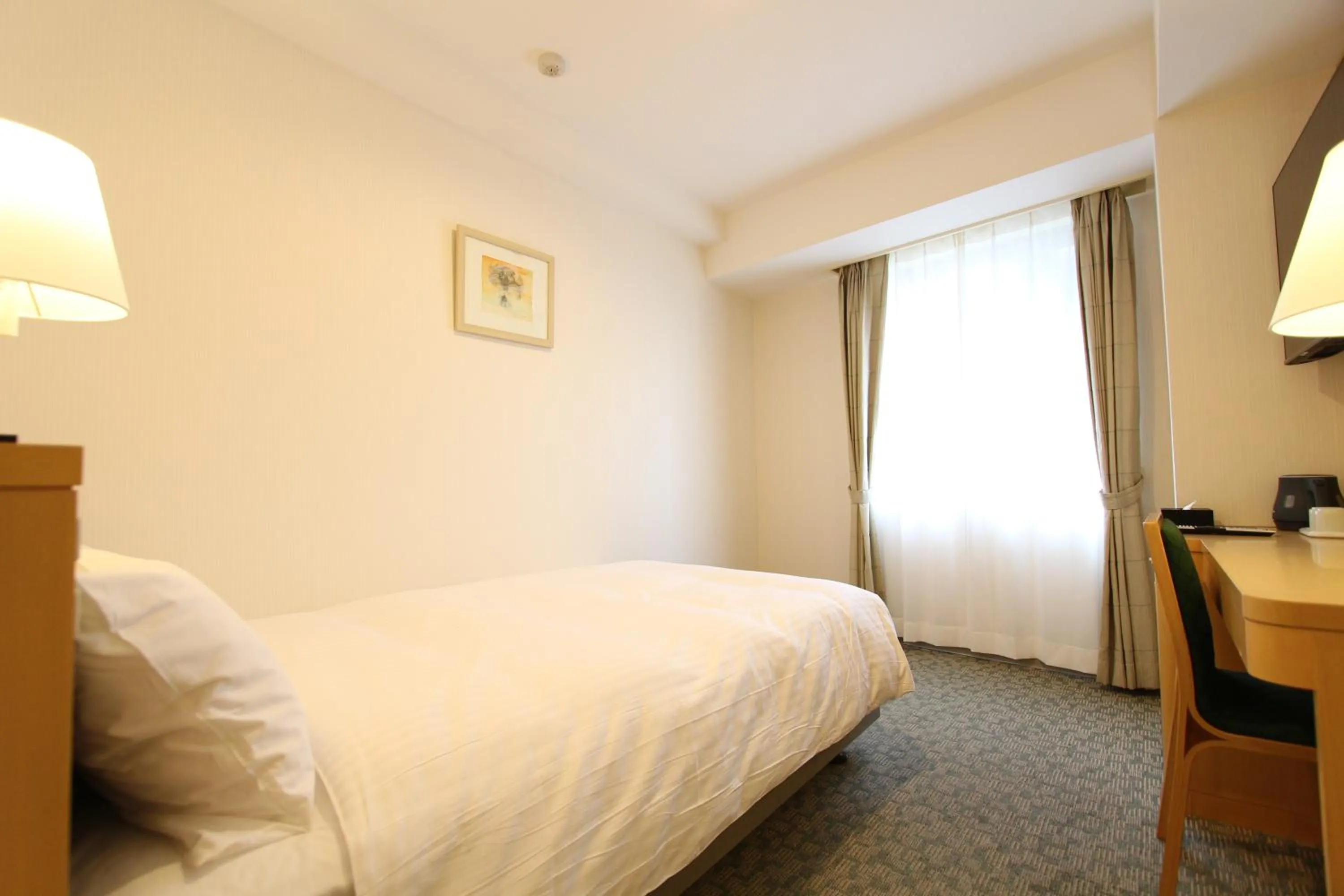 Photo of the whole room, Bed in KOKO HOTEL Sendai Station South