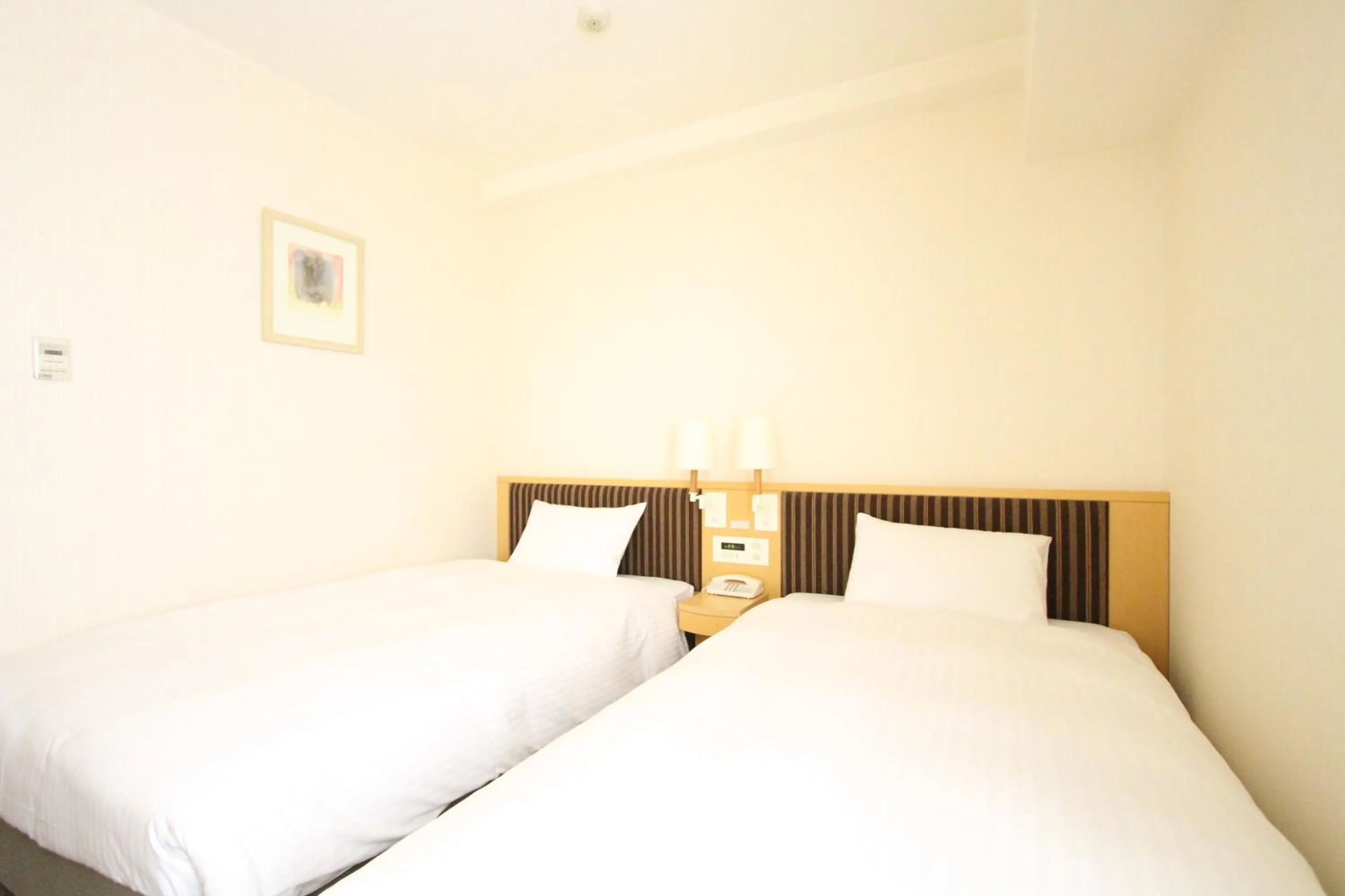 Photo of the whole room, Bed in KOKO HOTEL Sendai Station South