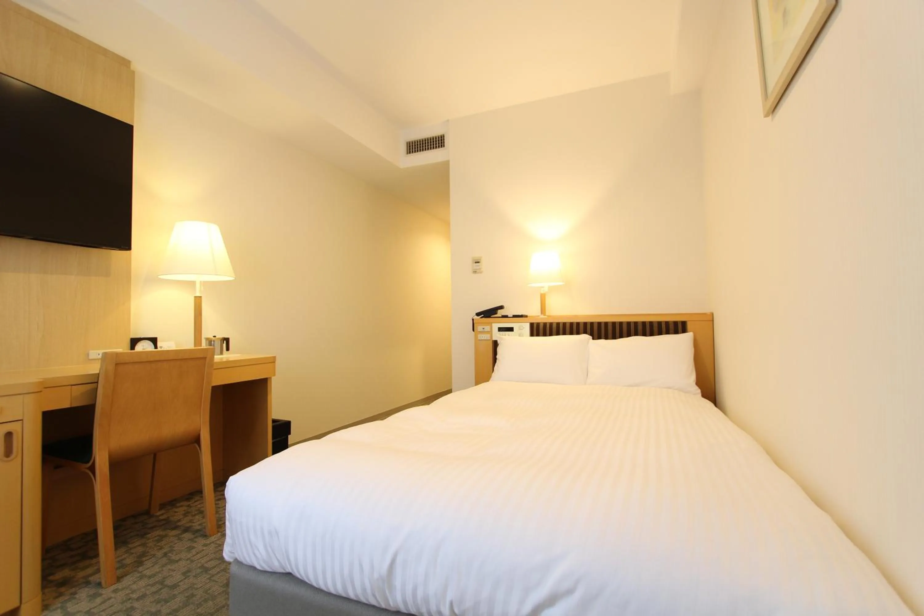 Photo of the whole room, Bed in KOKO HOTEL Sendai Station South