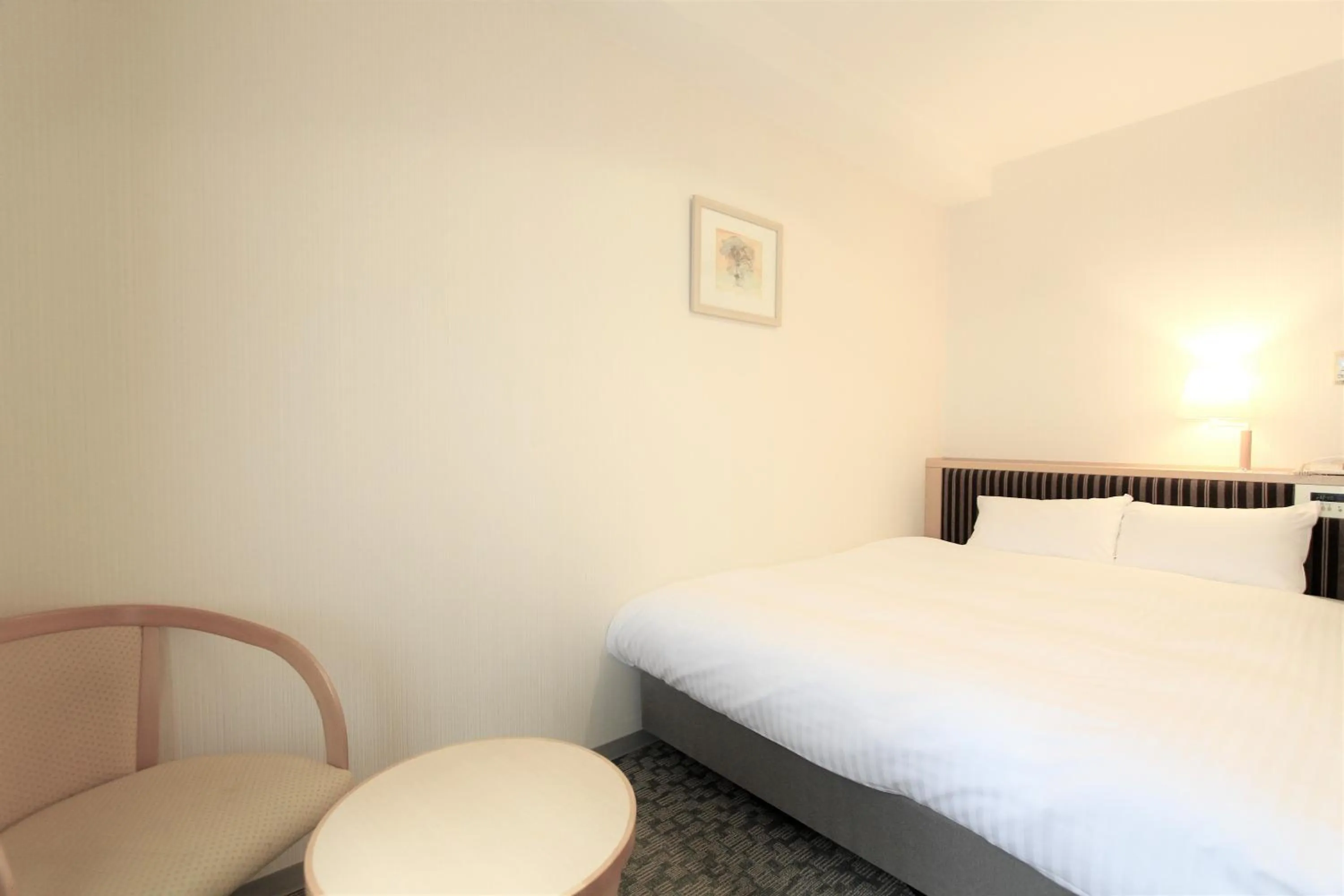 Photo of the whole room, Bed in KOKO HOTEL Sendai Station South