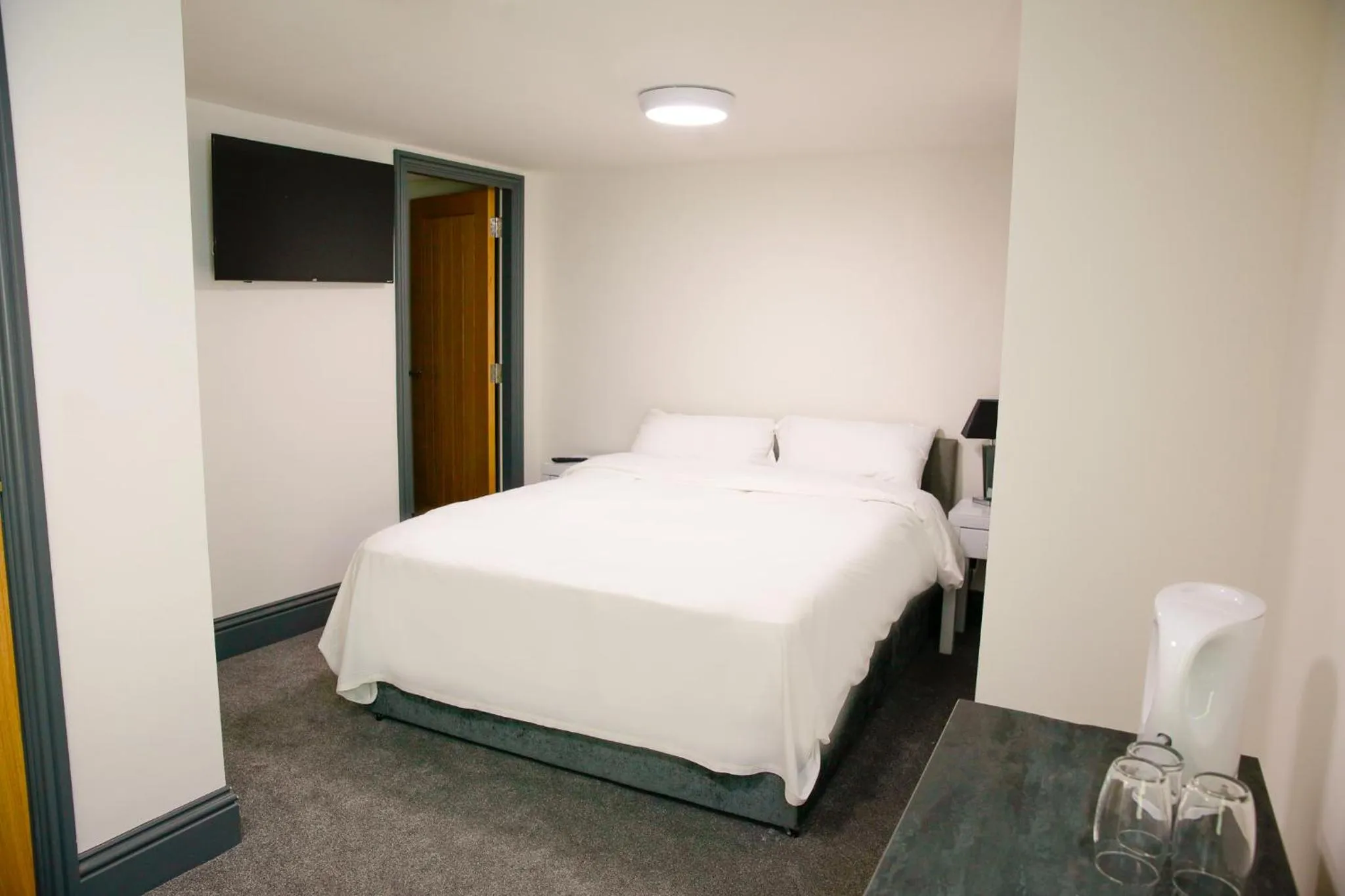 Bed in The George Wright Boutique Hotel, Bar & Restaurant