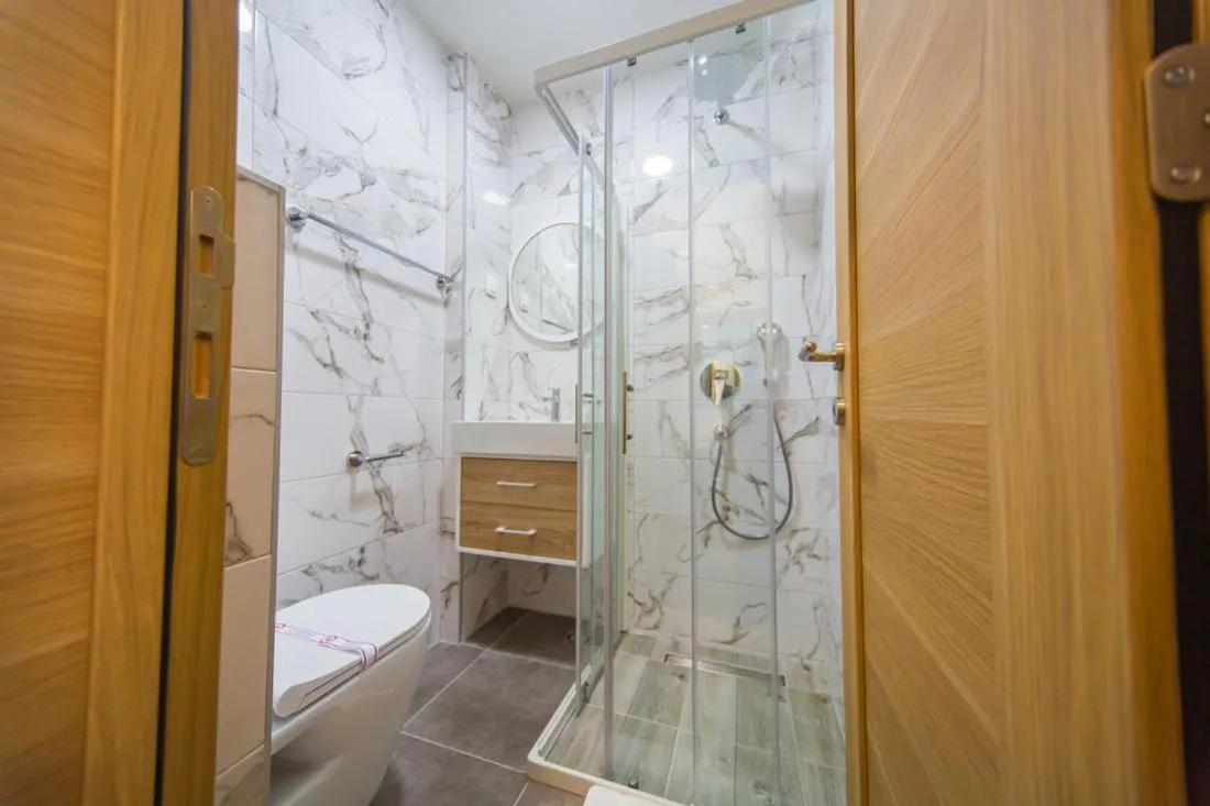 Shower in Rooftop Apartments & Rooms