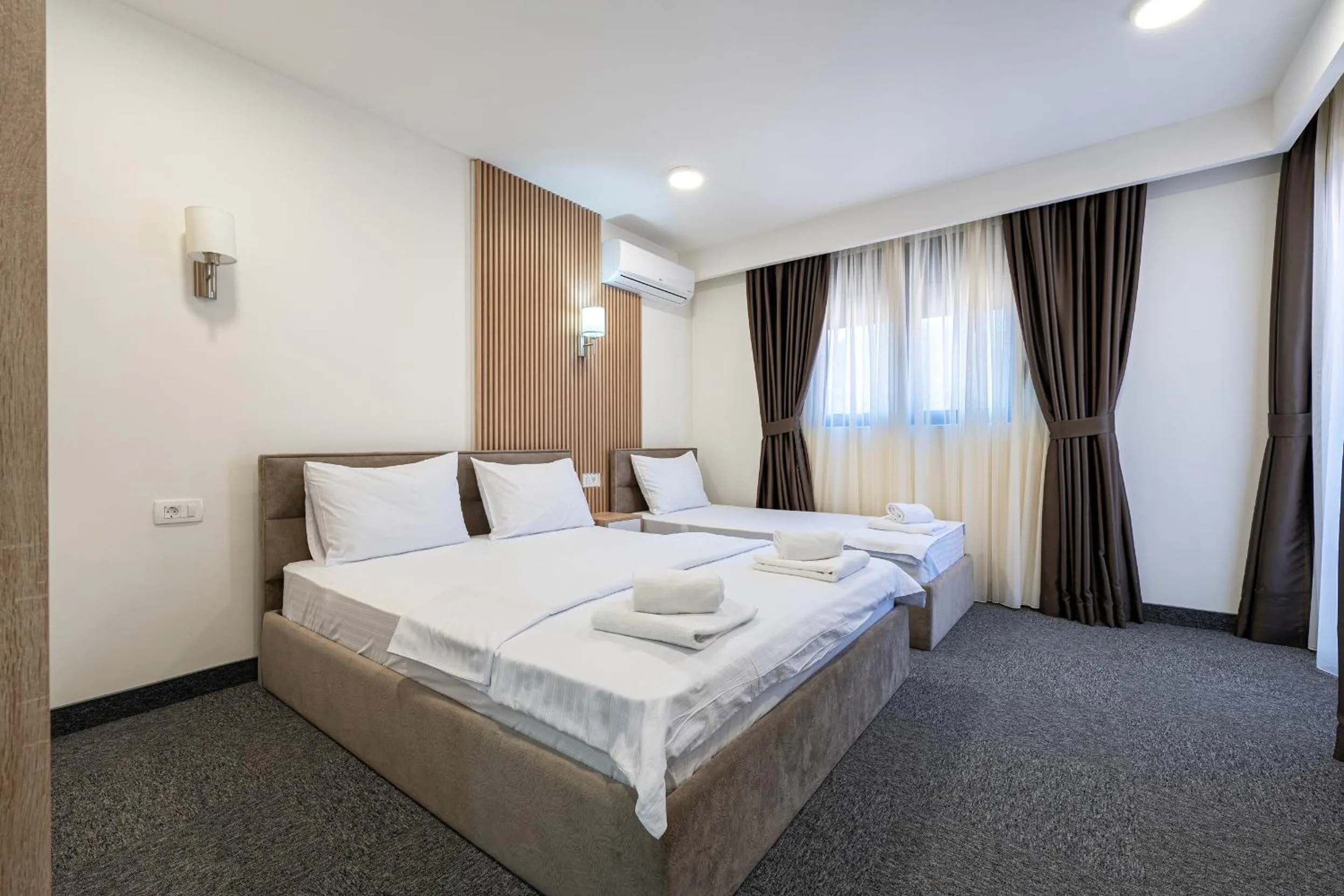 Bed in Rooftop Apartments & Rooms