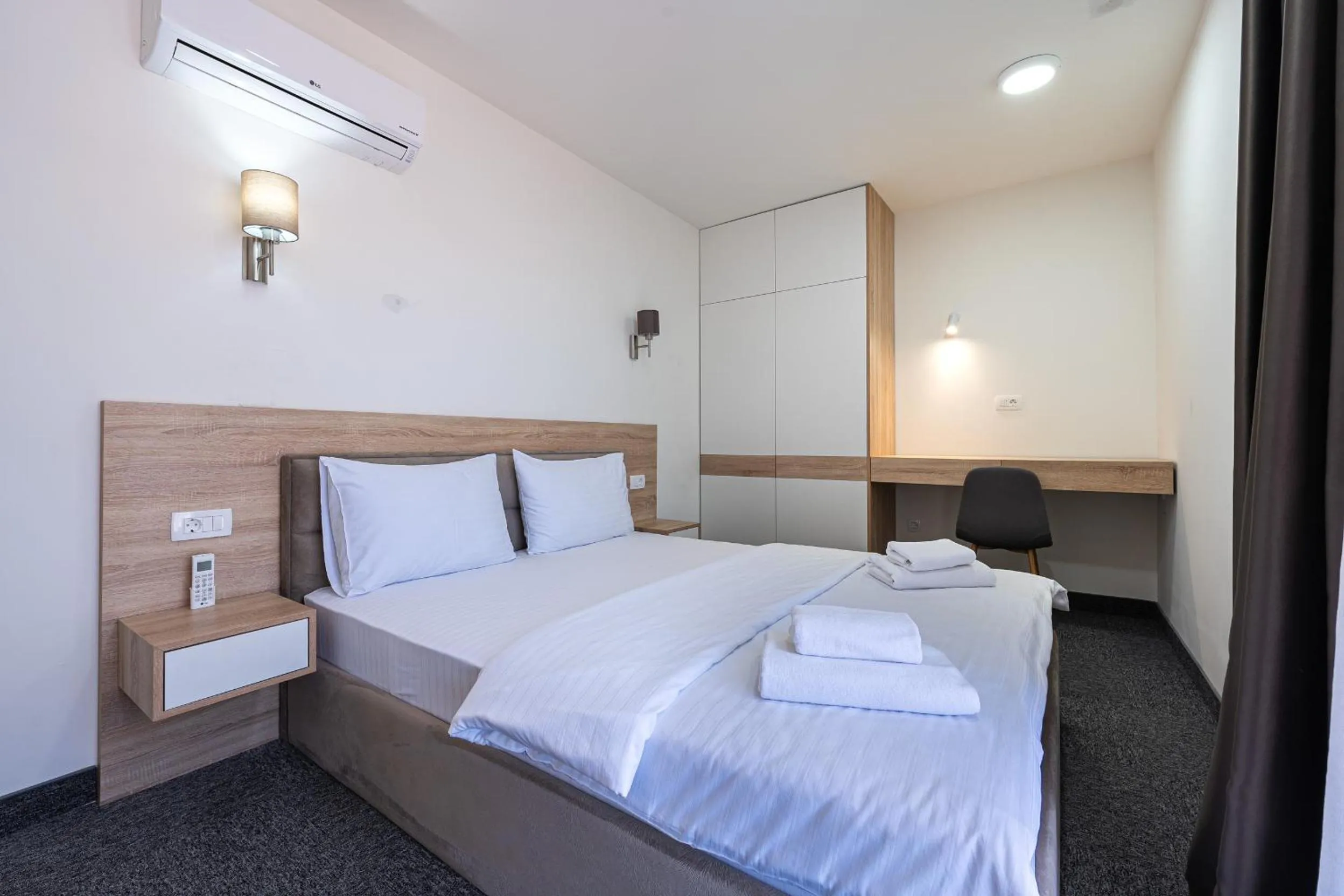 Bed in Rooftop Apartments & Rooms