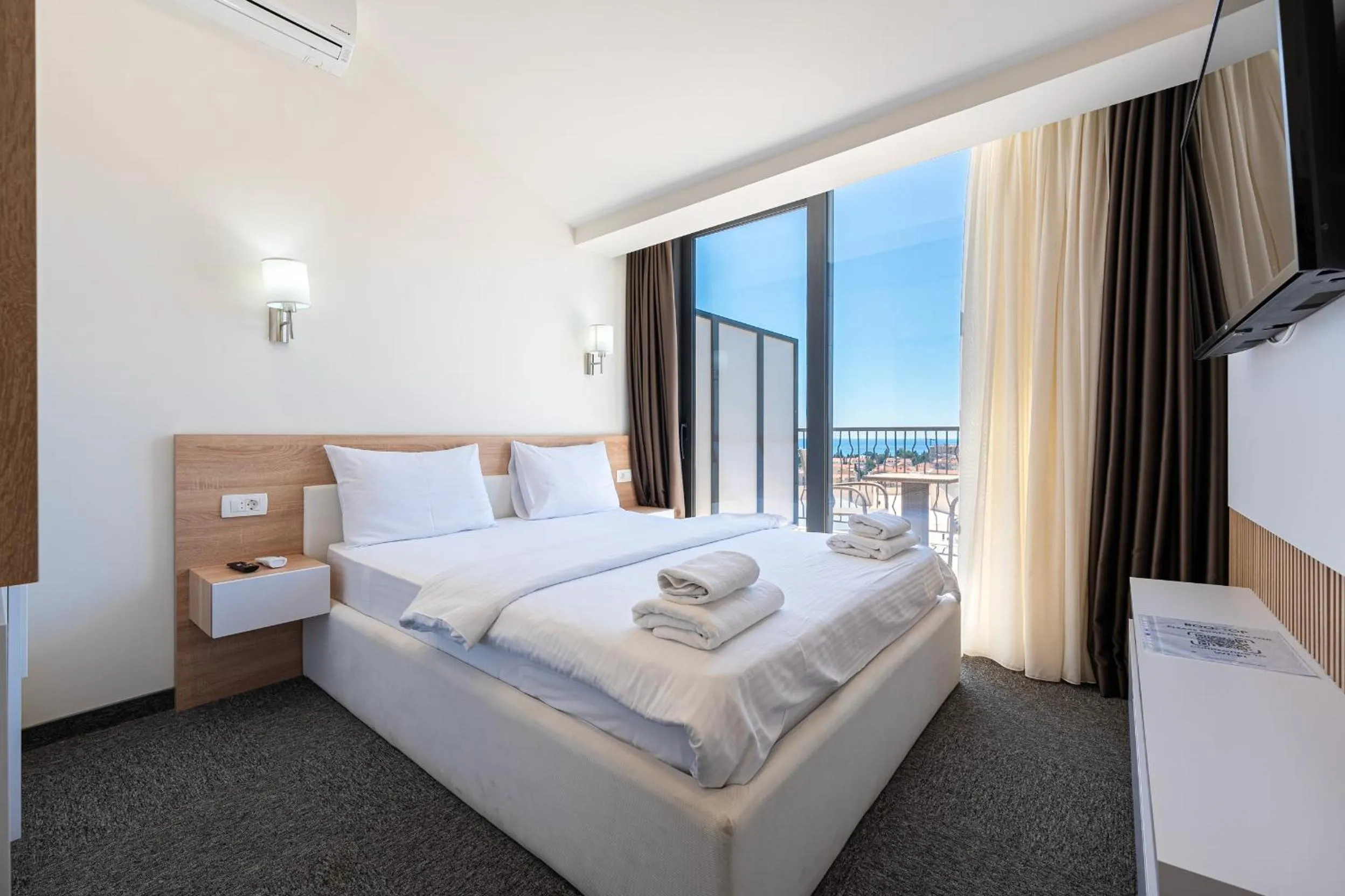 Bed in Rooftop Apartments & Rooms
