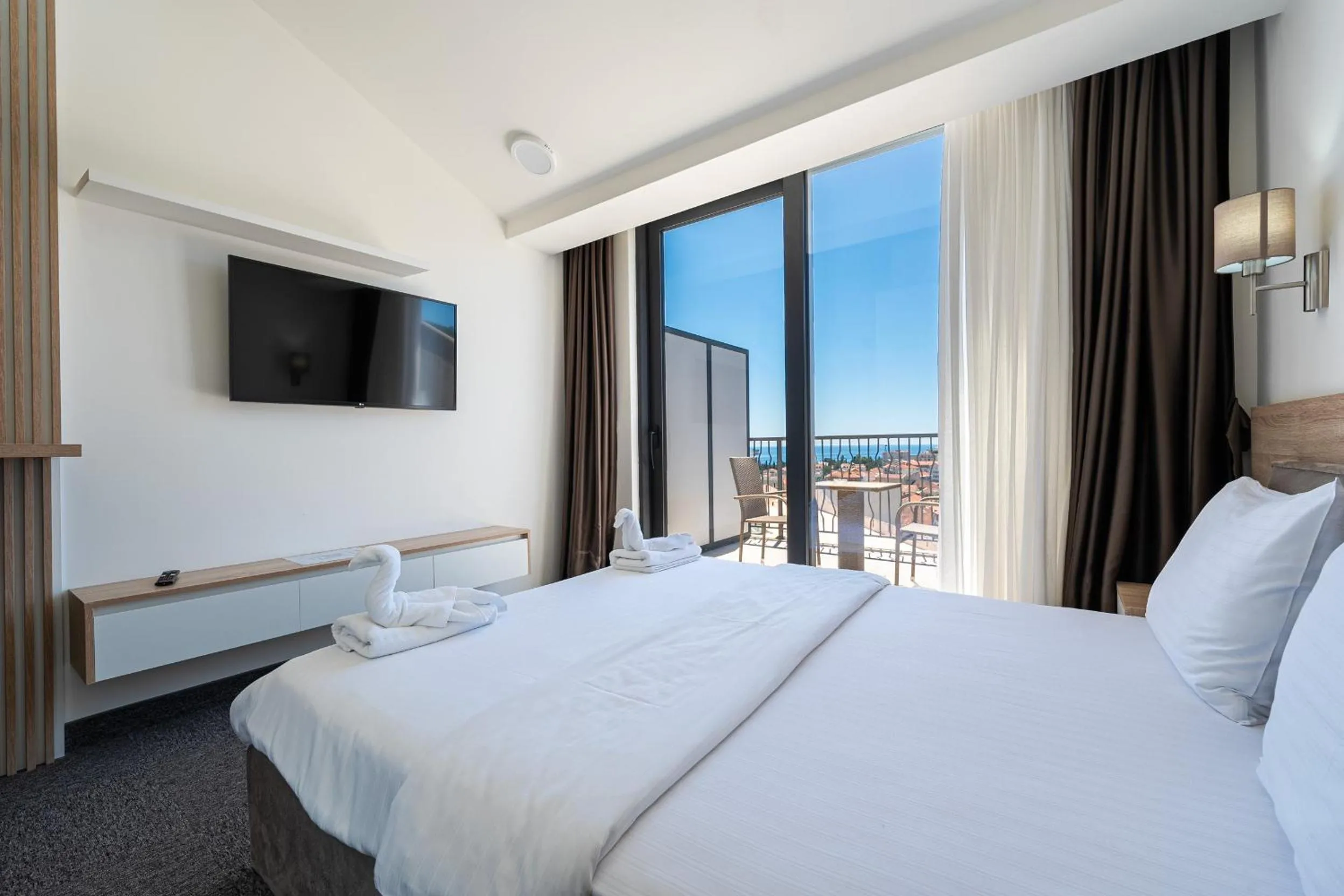 Balcony/Terrace, Bed in Rooftop Apartments & Rooms
