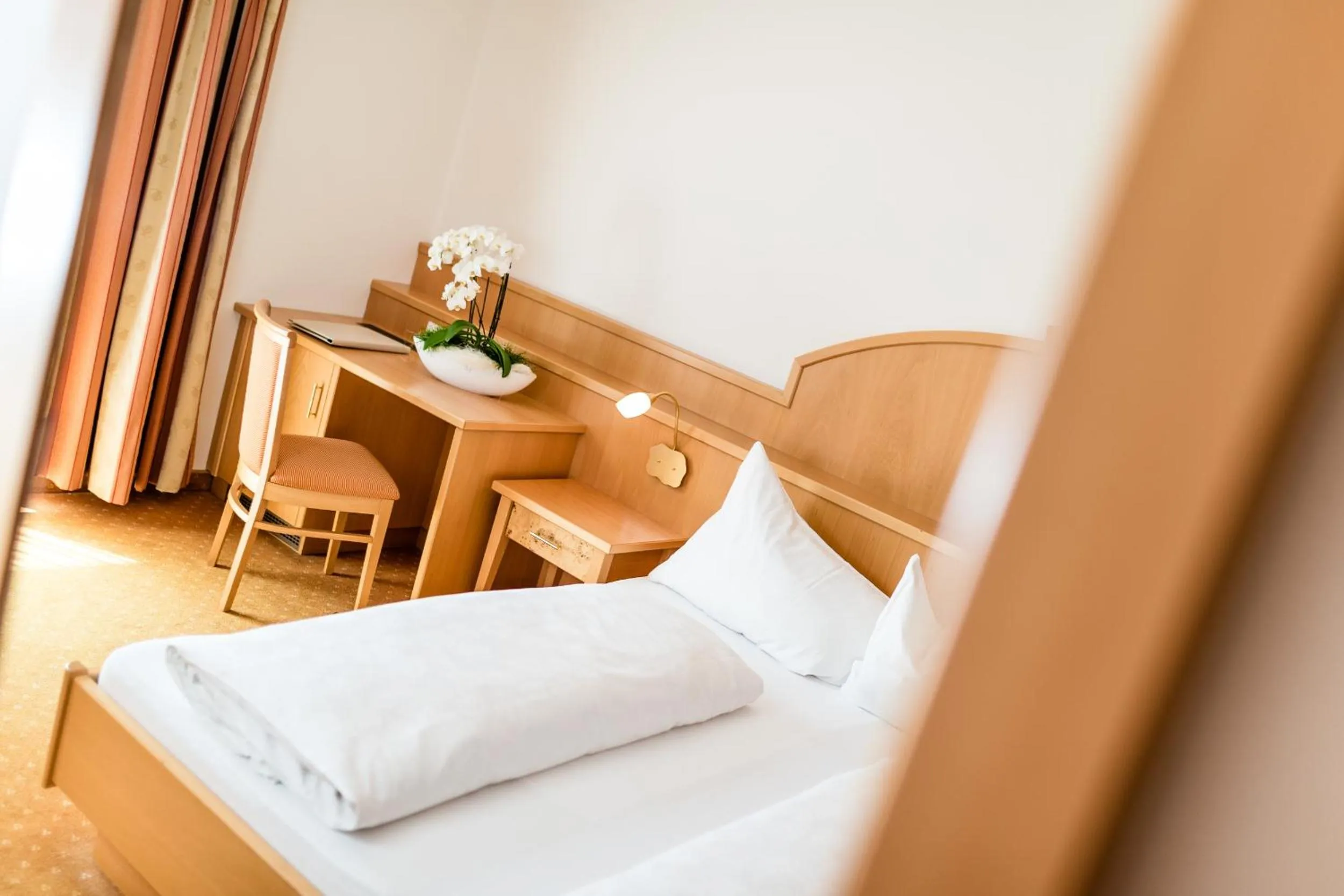 Photo of the whole room, Bed in Garni Hotel Am Meilenstein