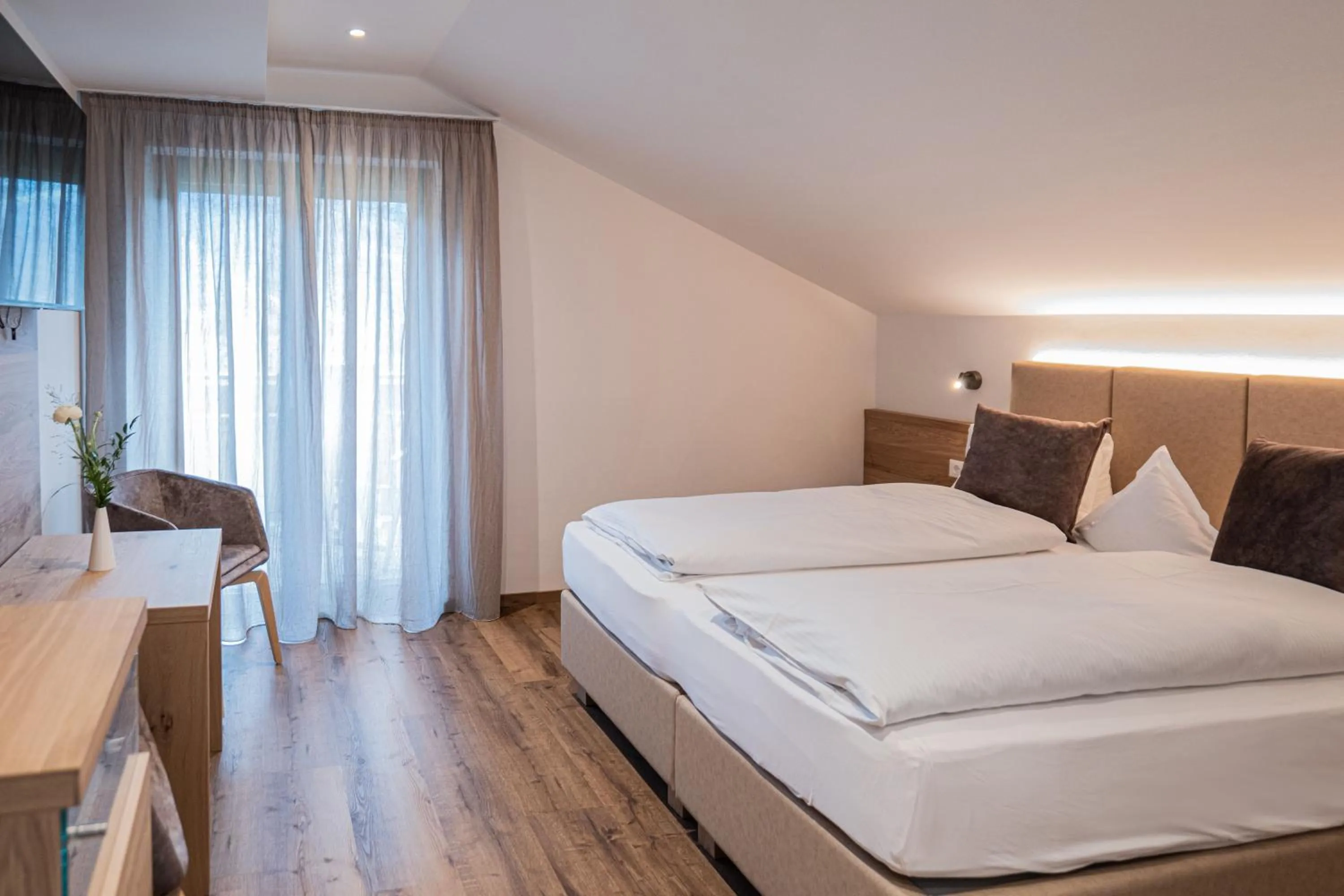 Photo of the whole room, Bed in Garni Hotel Am Meilenstein