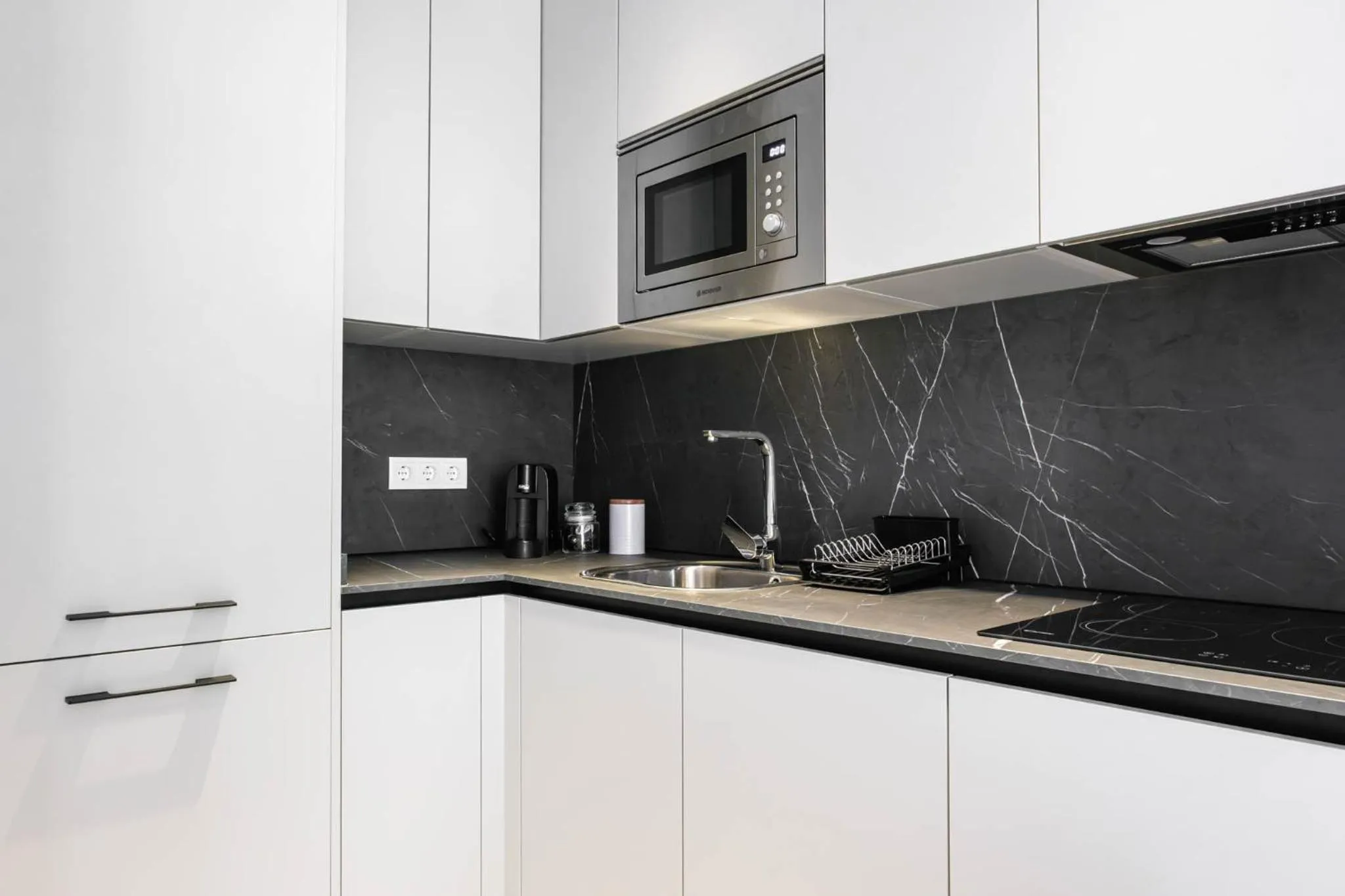 Kitchen or kitchenette in Apartamentos El Reloj