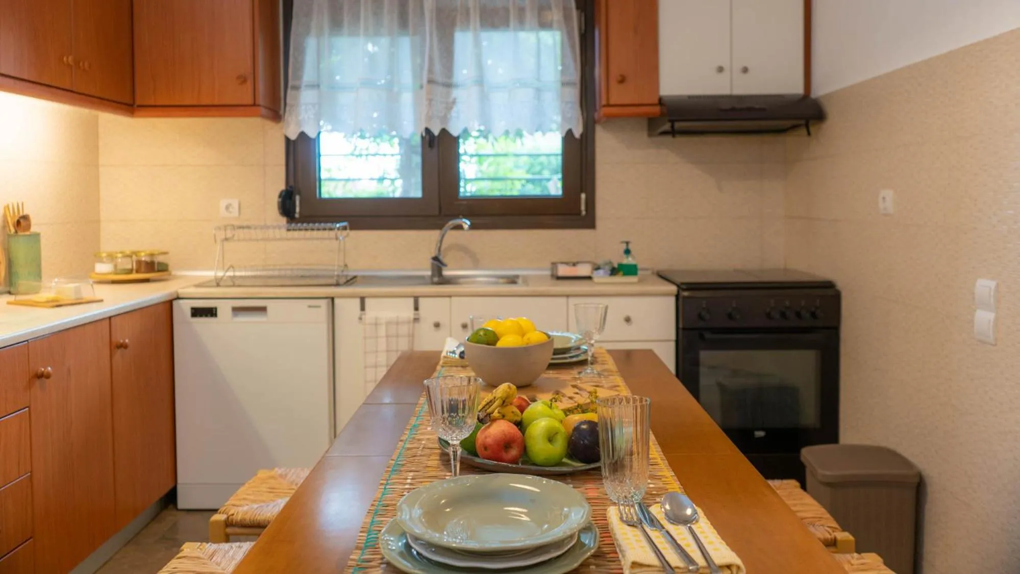 Kitchen or kitchenette in Postmans Apartment Under Meteora