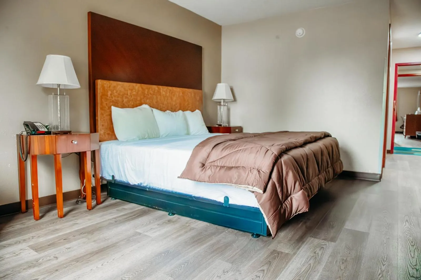 Bed in Country Garden & Suites