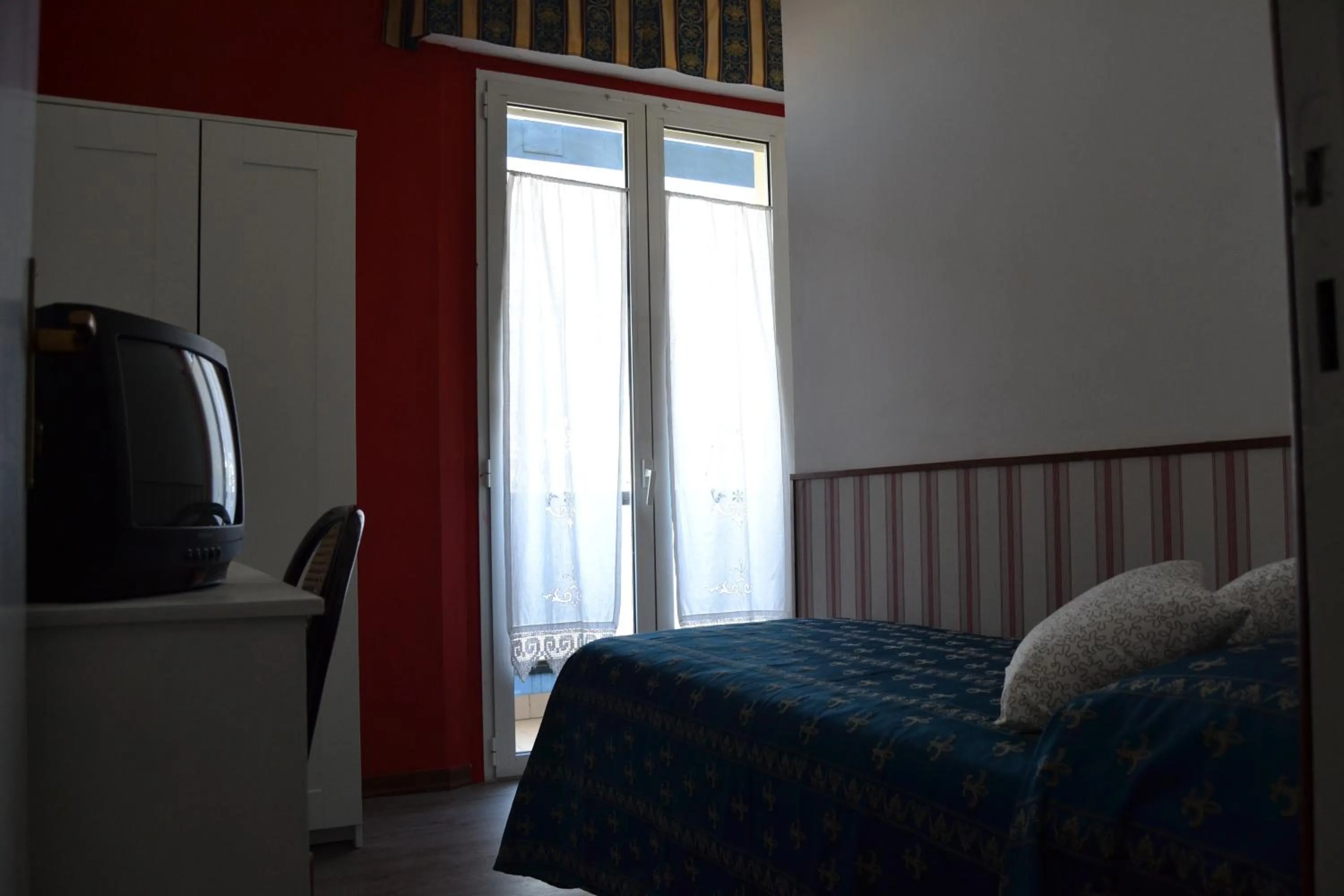 Bed in Hotel Vergilius