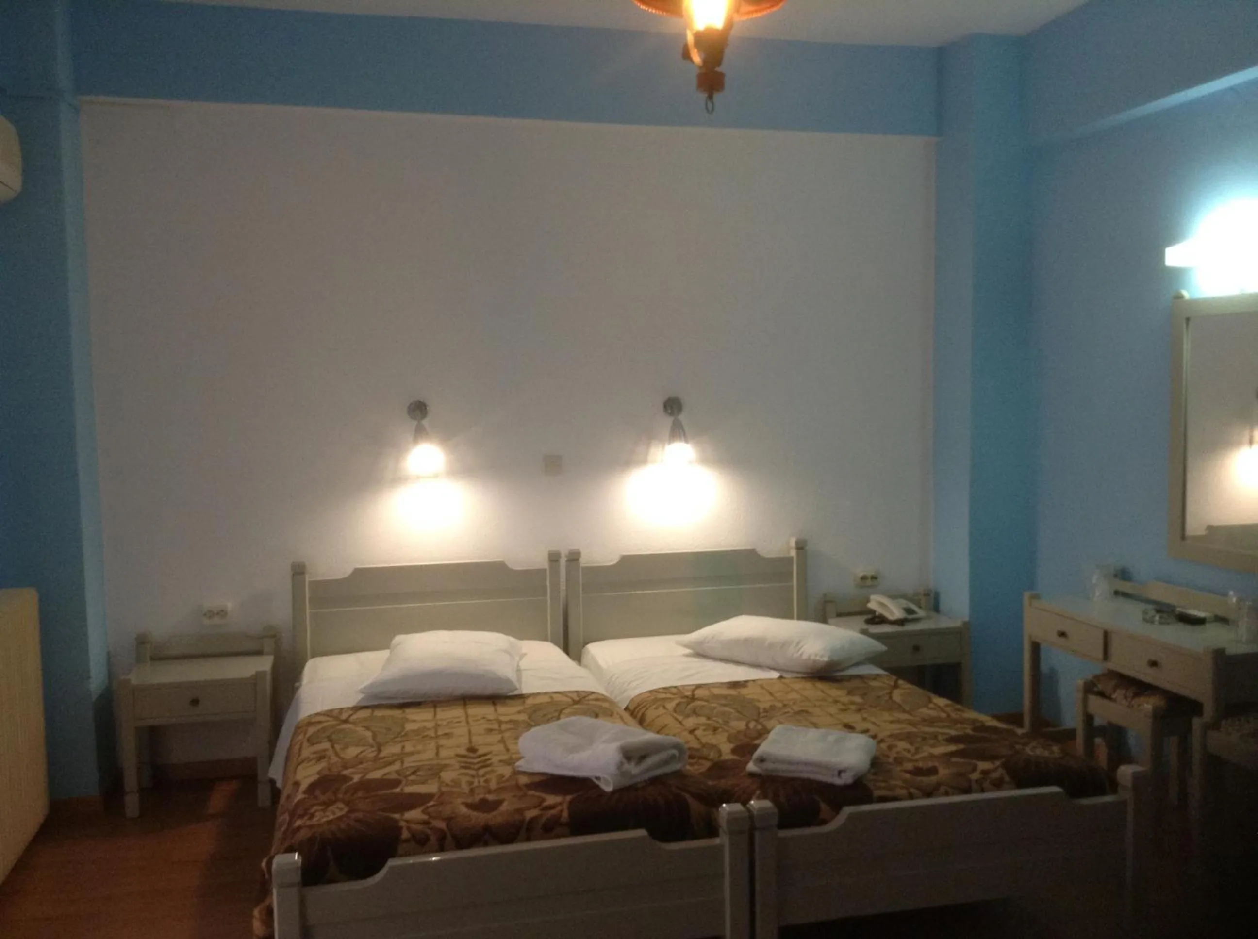 Bed in Haritos Hotel - Geothermal Hot Swimming Pool