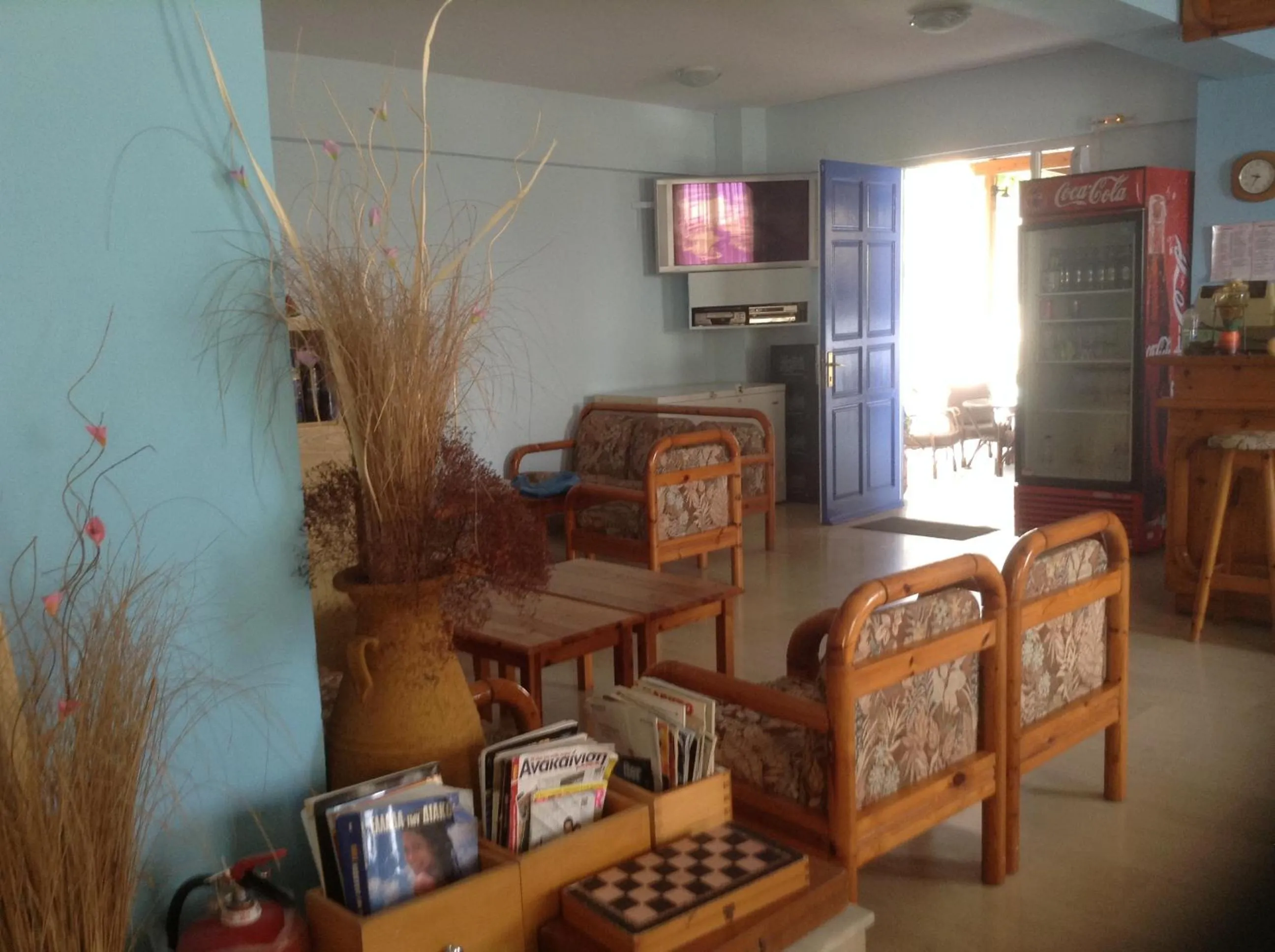 Communal lounge/ TV room in Haritos Hotel - Geothermal Hot Swimming Pool