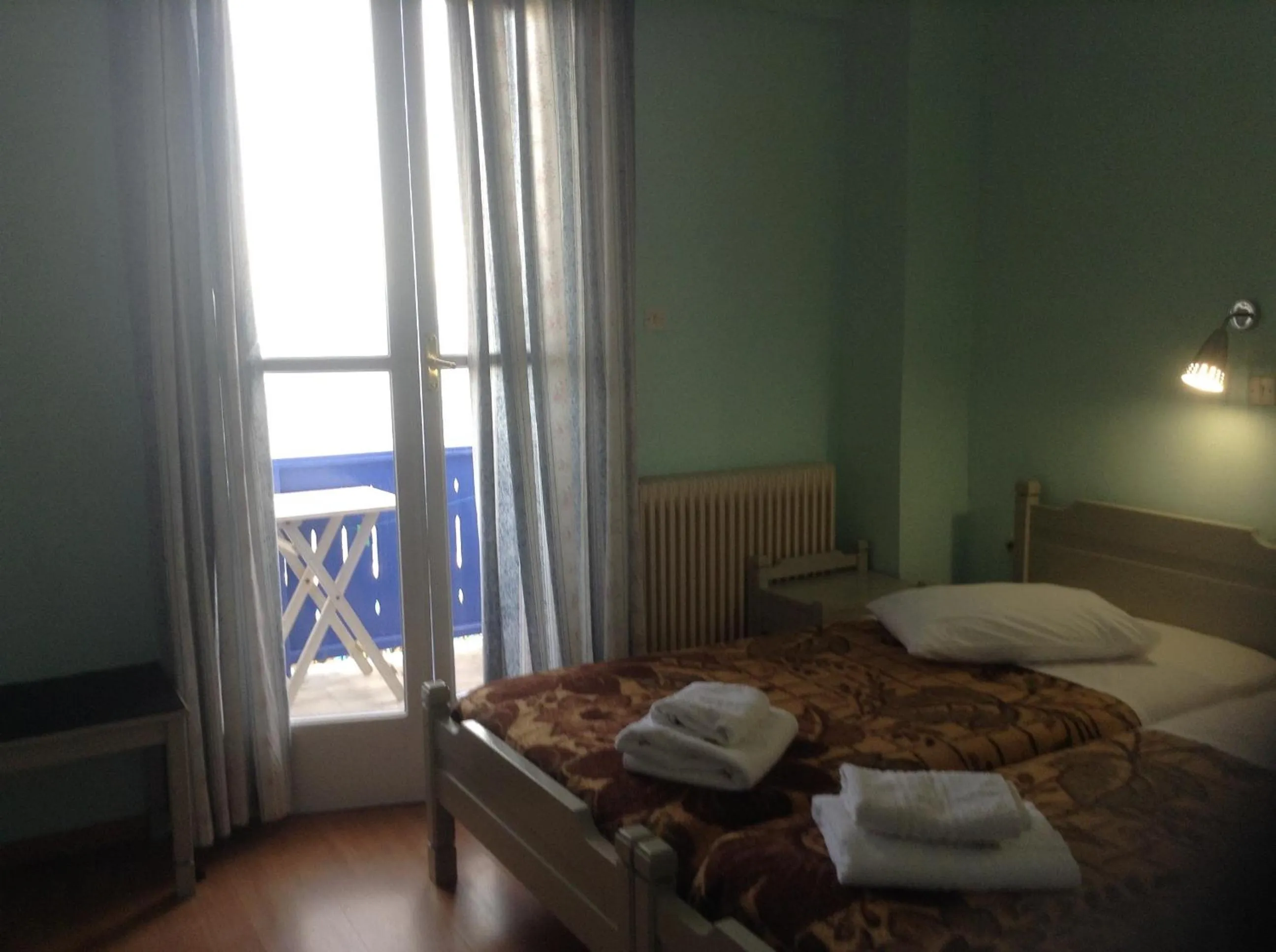 Bedroom in Haritos Hotel - Geothermal Hot Swimming Pool