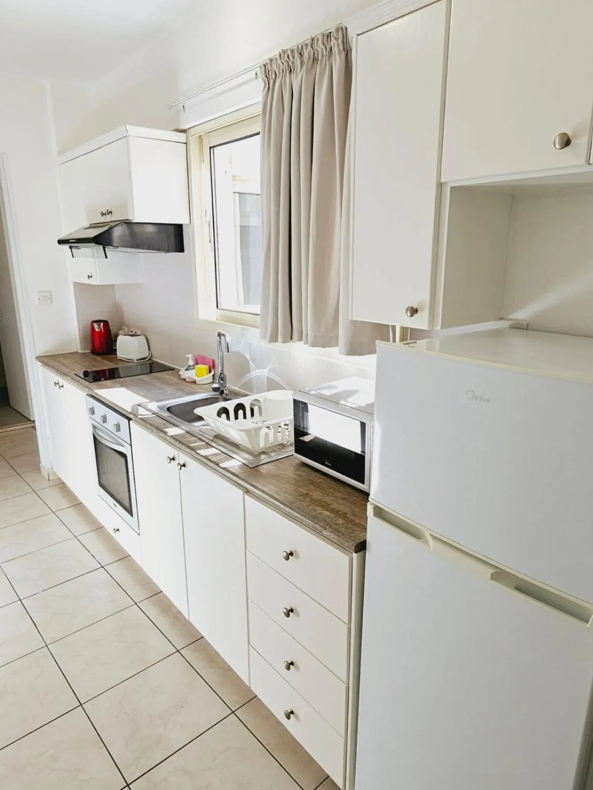 Kitchen or kitchenette in Stephanie City Apartments