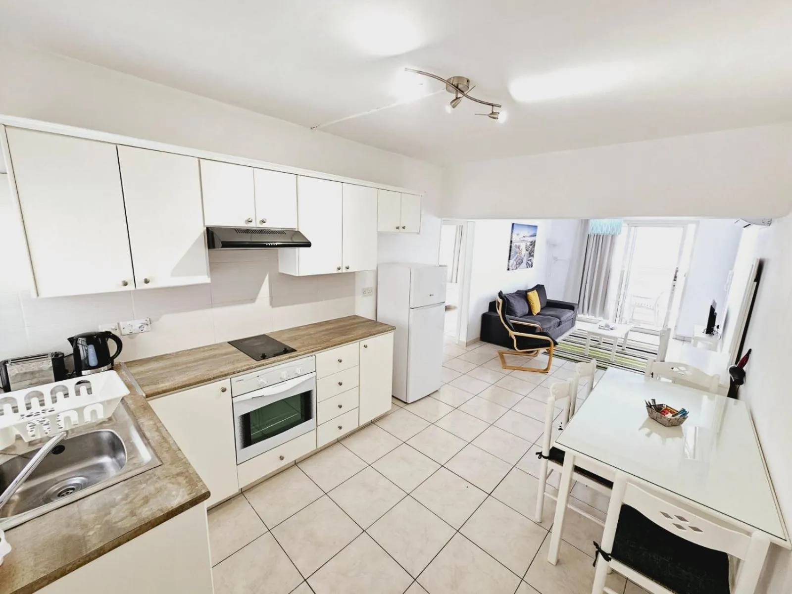 Kitchen or kitchenette in Stephanie City Apartments