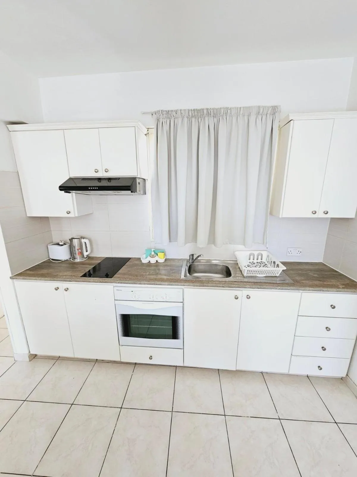 Kitchen or kitchenette in Stephanie City Apartments