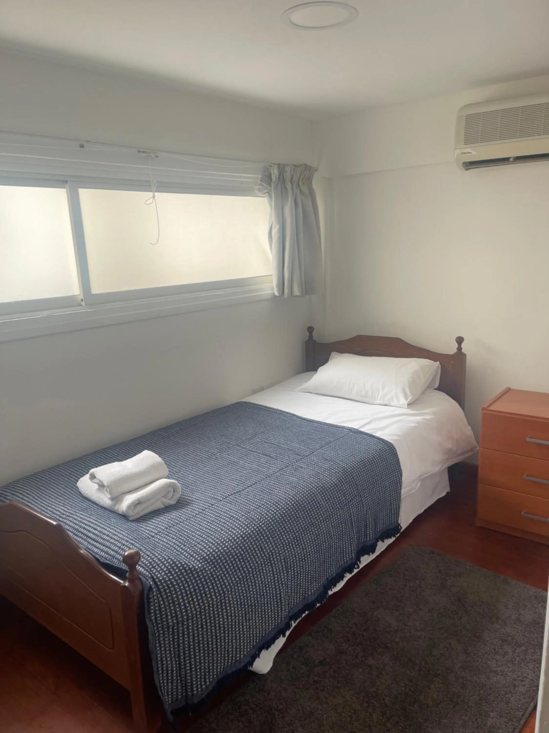 Bed in Stephanie City Apartments