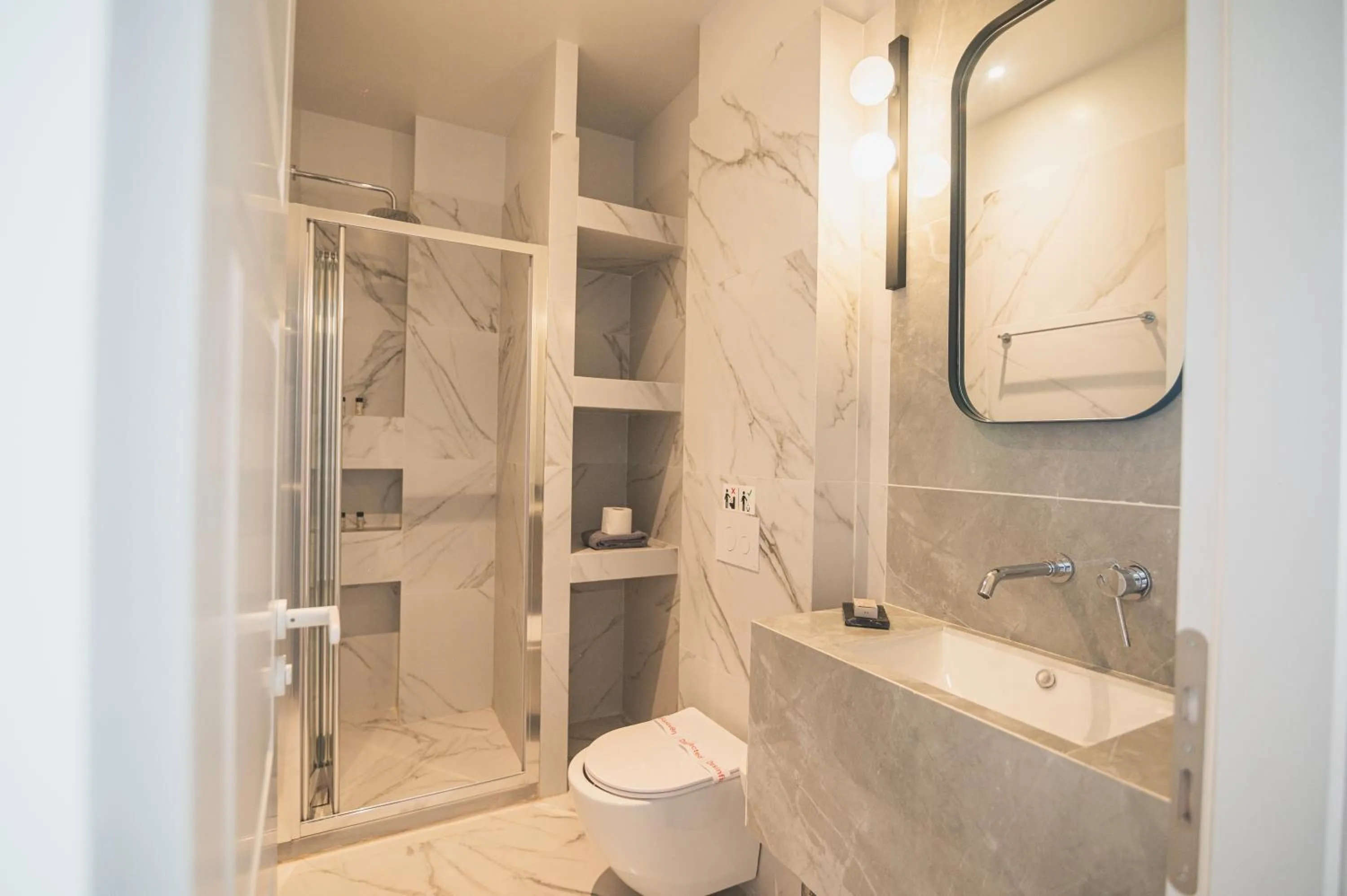 Toilet in Downtown Suites by Athens Tower