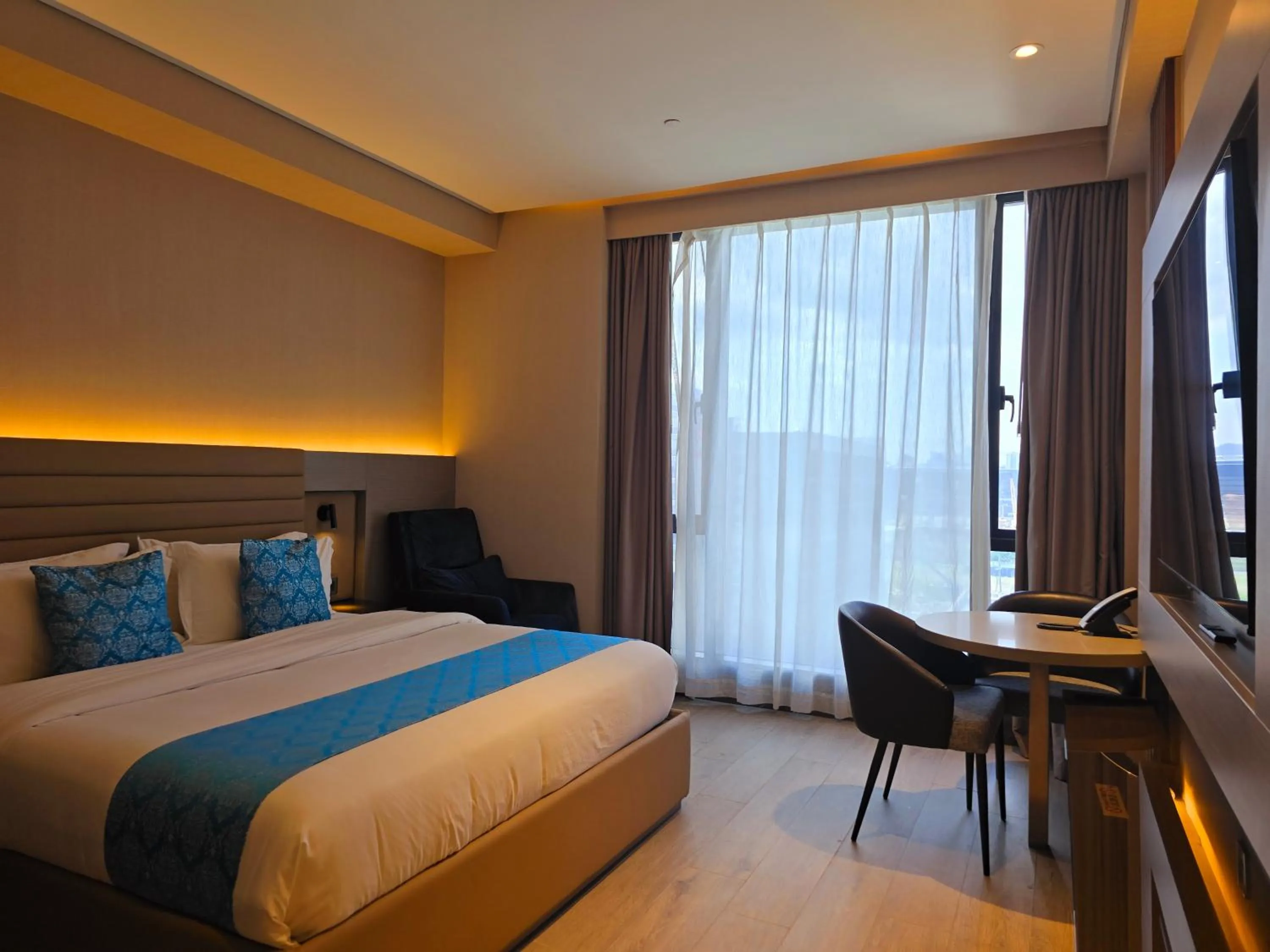 Bed in Bayprime Hotel