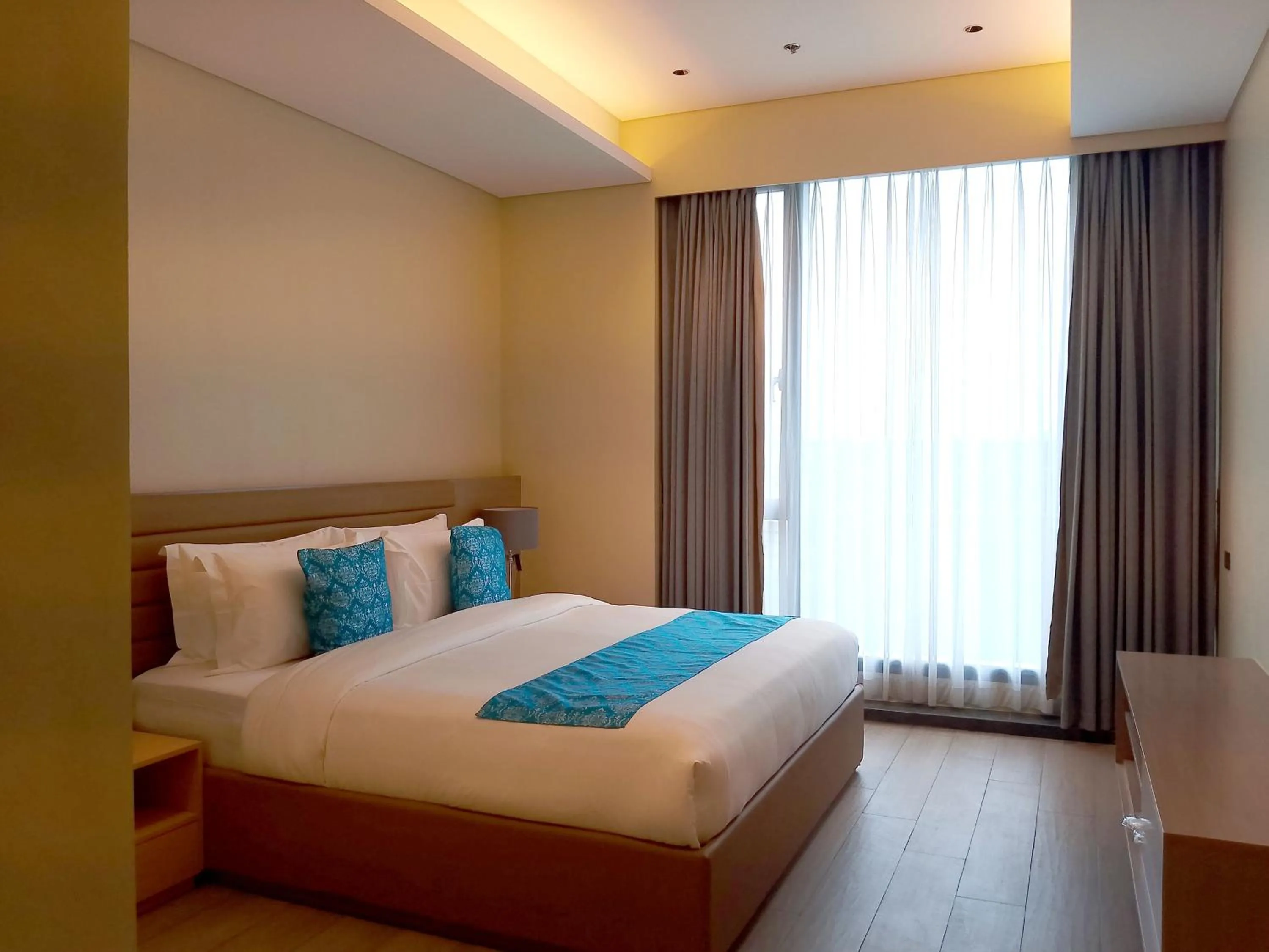 Bed in Bayprime Hotel