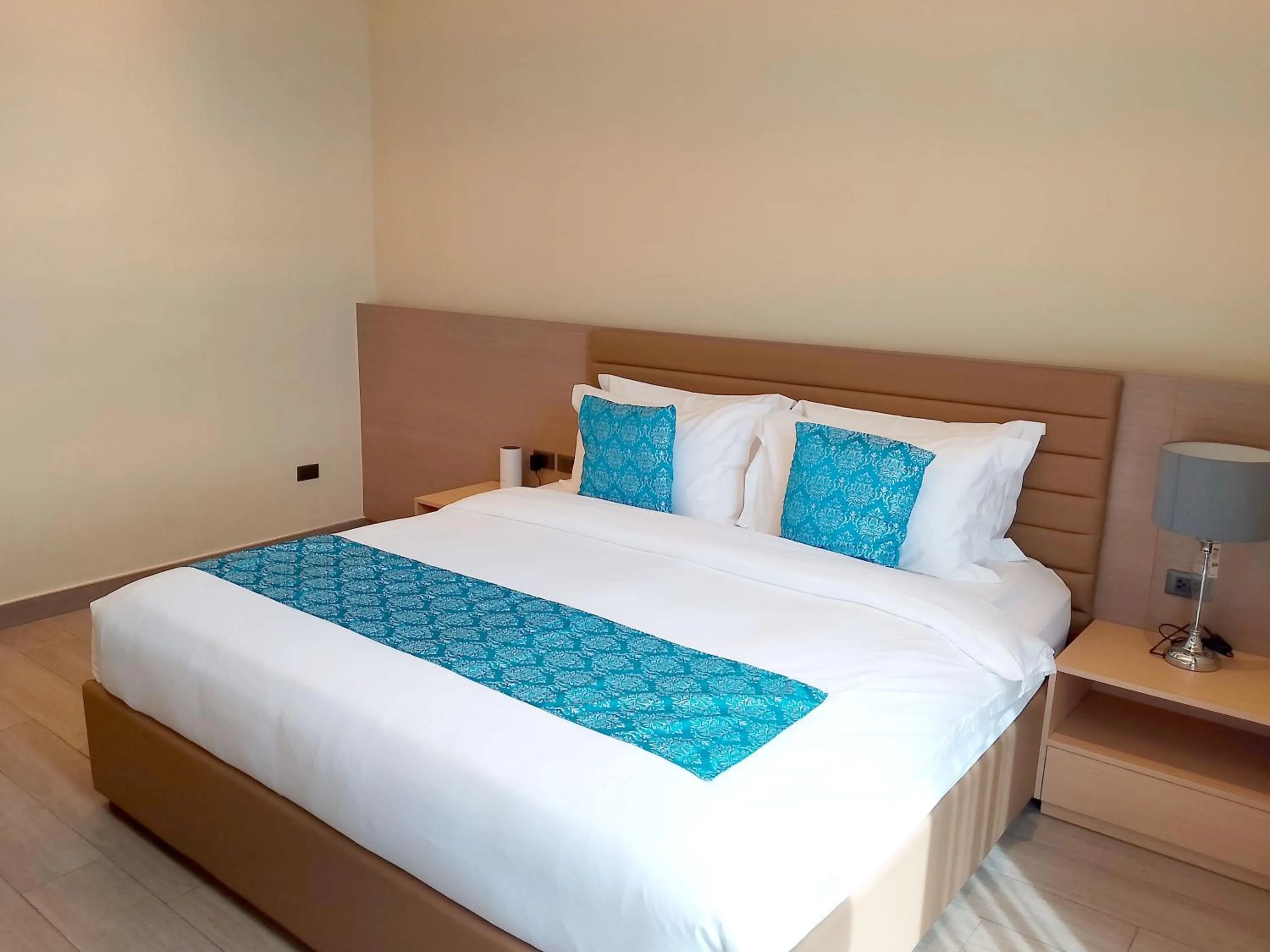 Bed in Bayprime Hotel