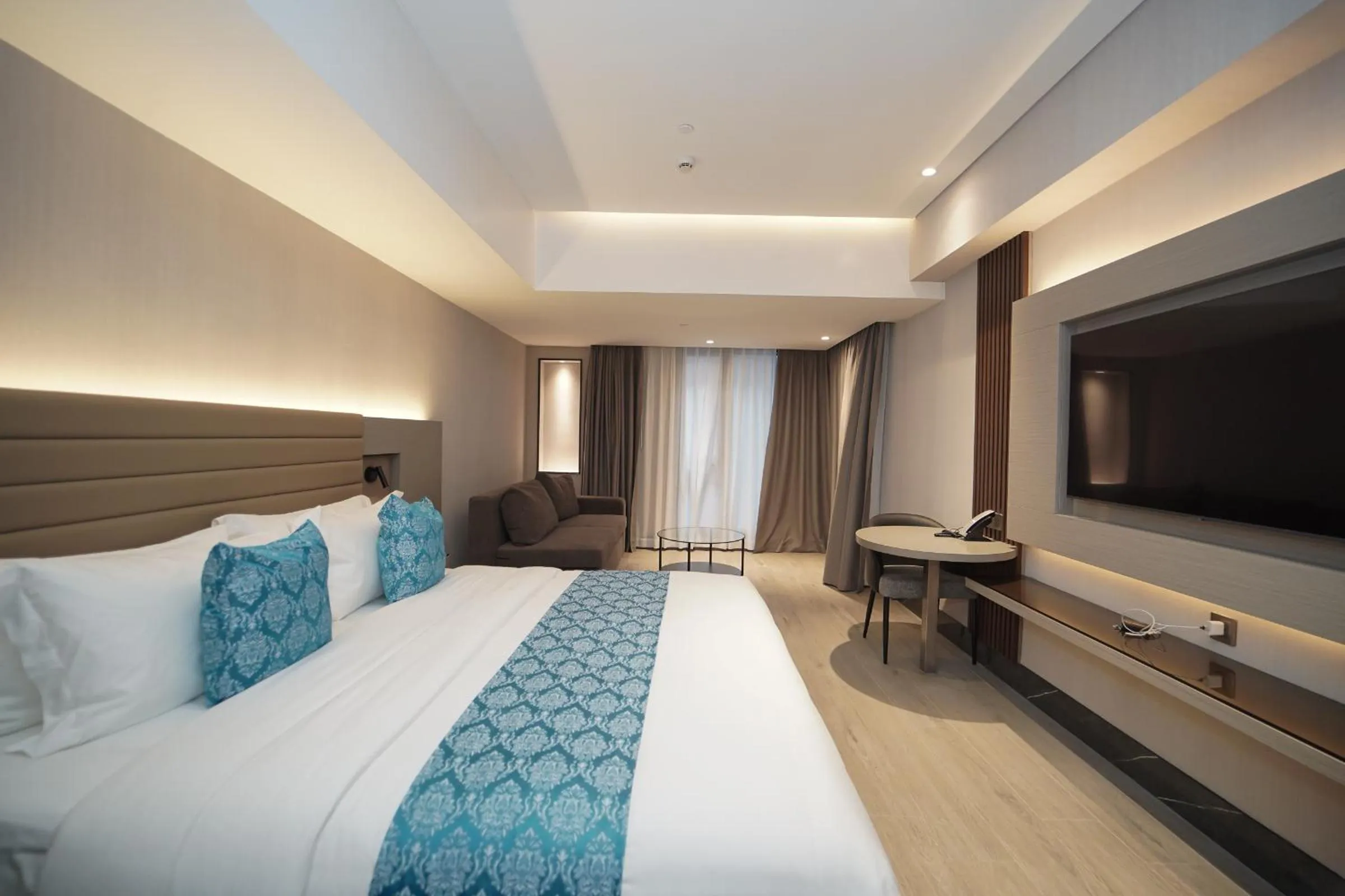 Bed in Bayprime Hotel