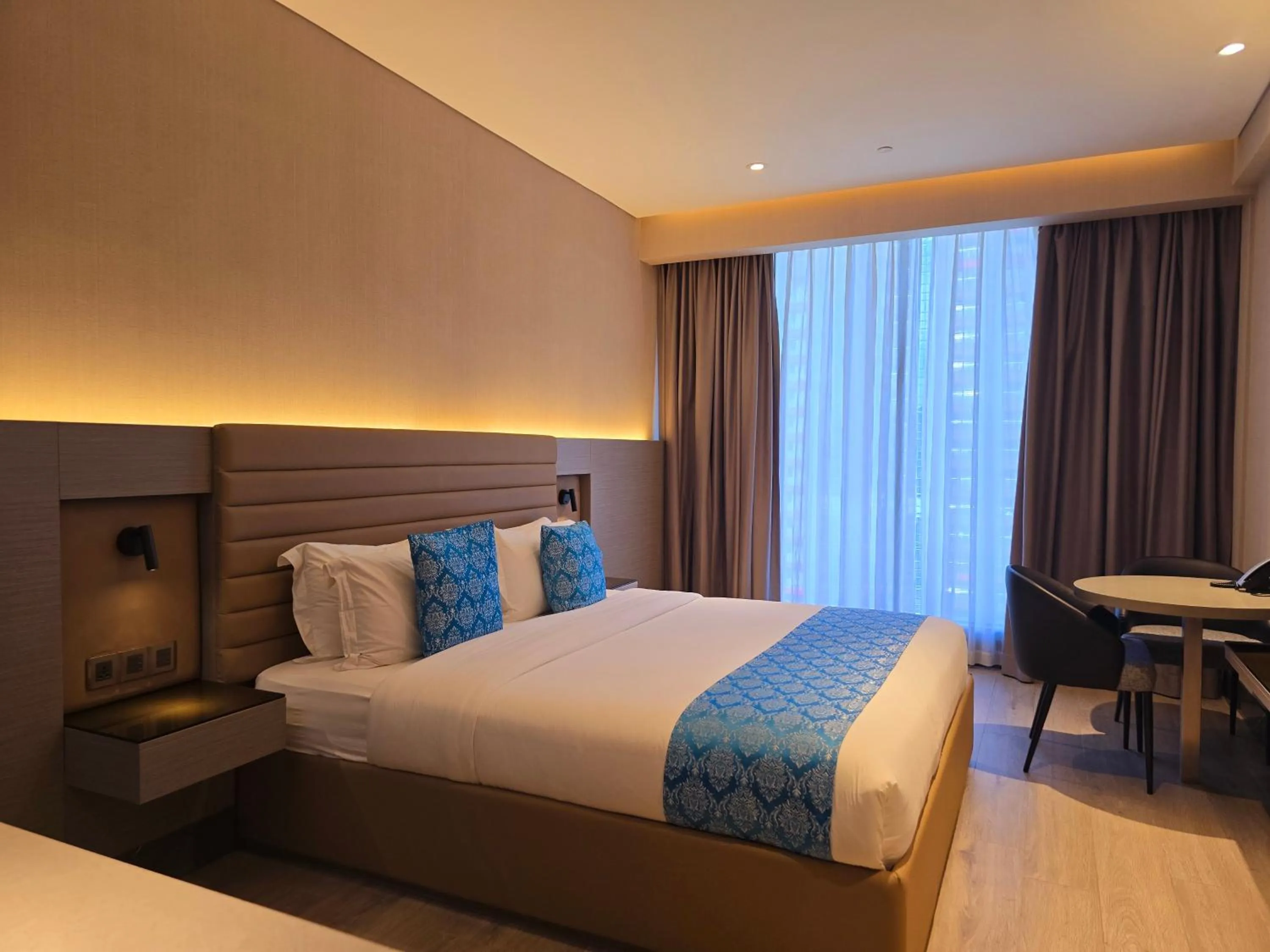 Bed in Bayprime Hotel