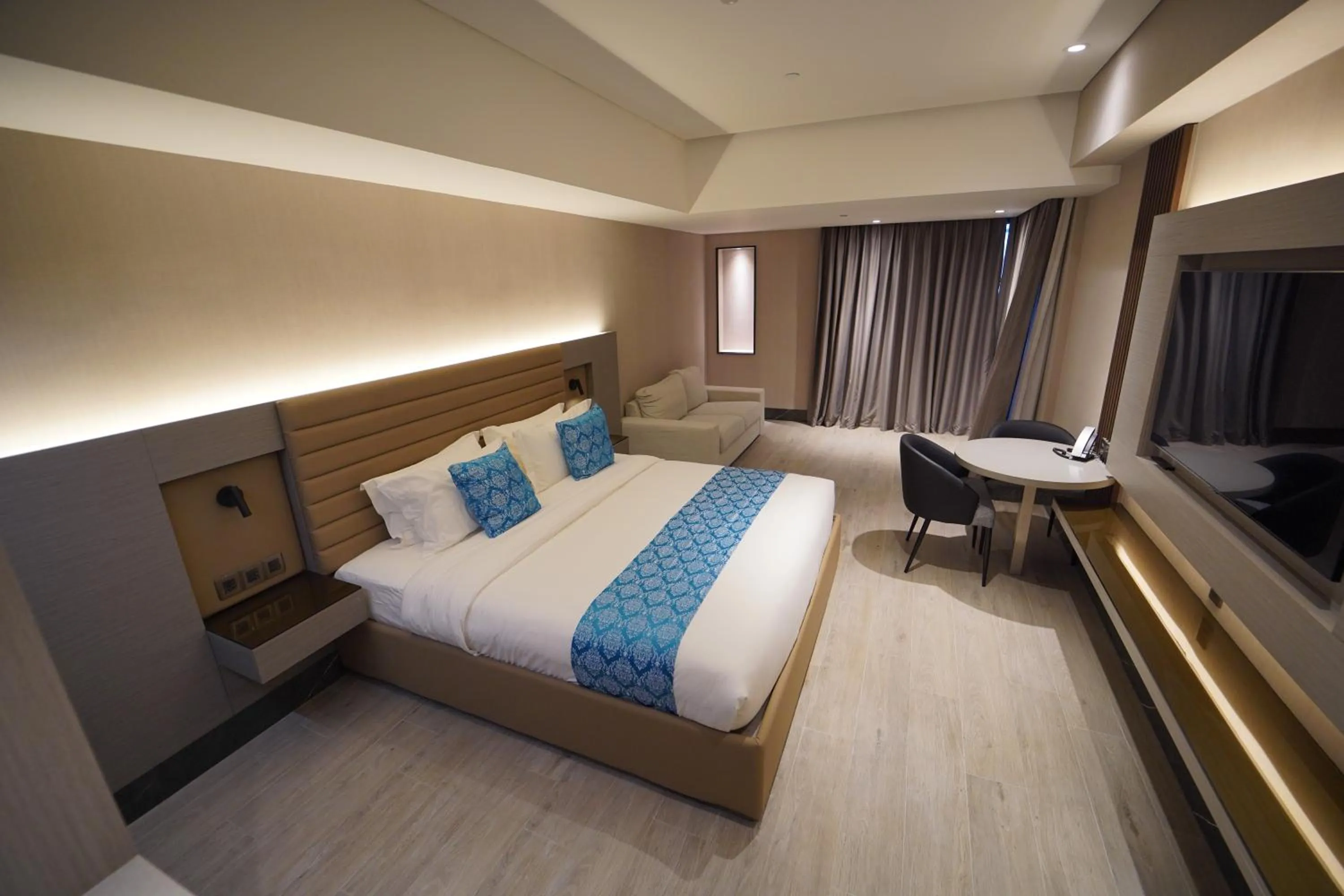 Bed in Bayprime Hotel