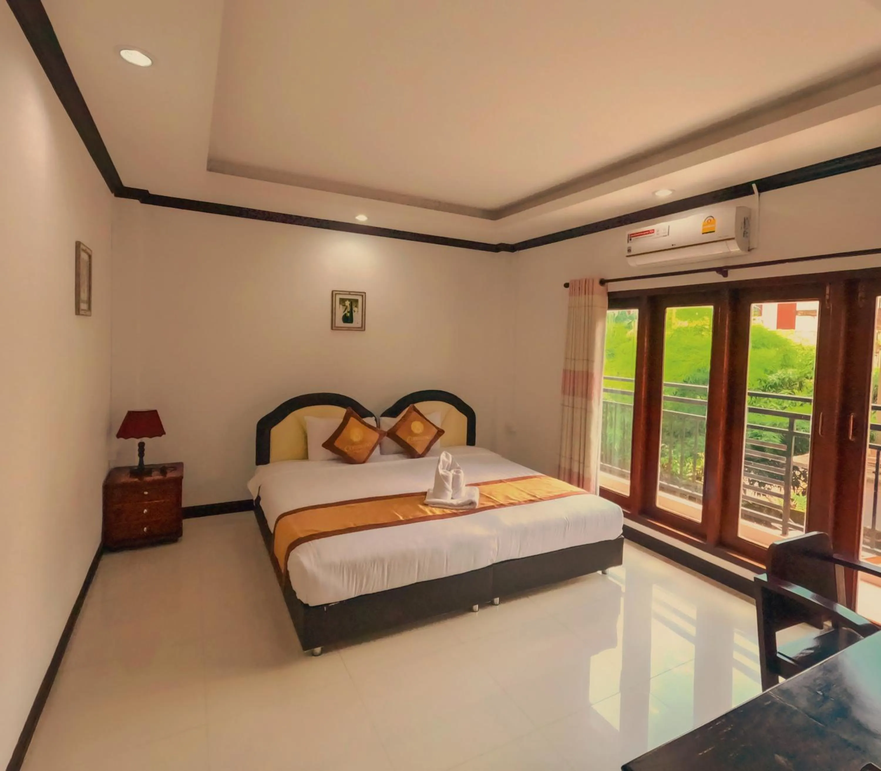 Bedroom, Bed in Vang Vieng Consiana Hotel