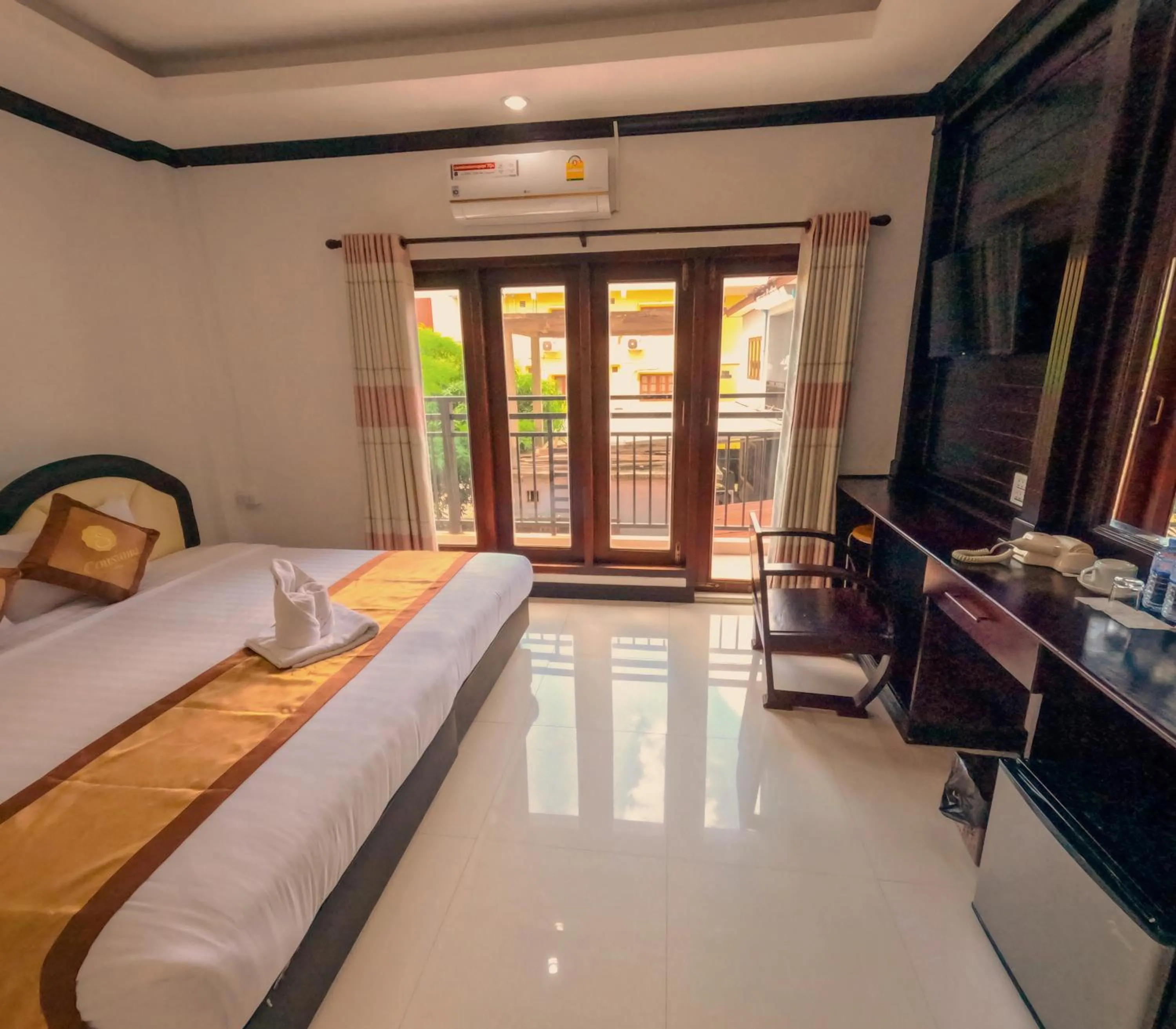 Bed in Vang Vieng Consiana Hotel