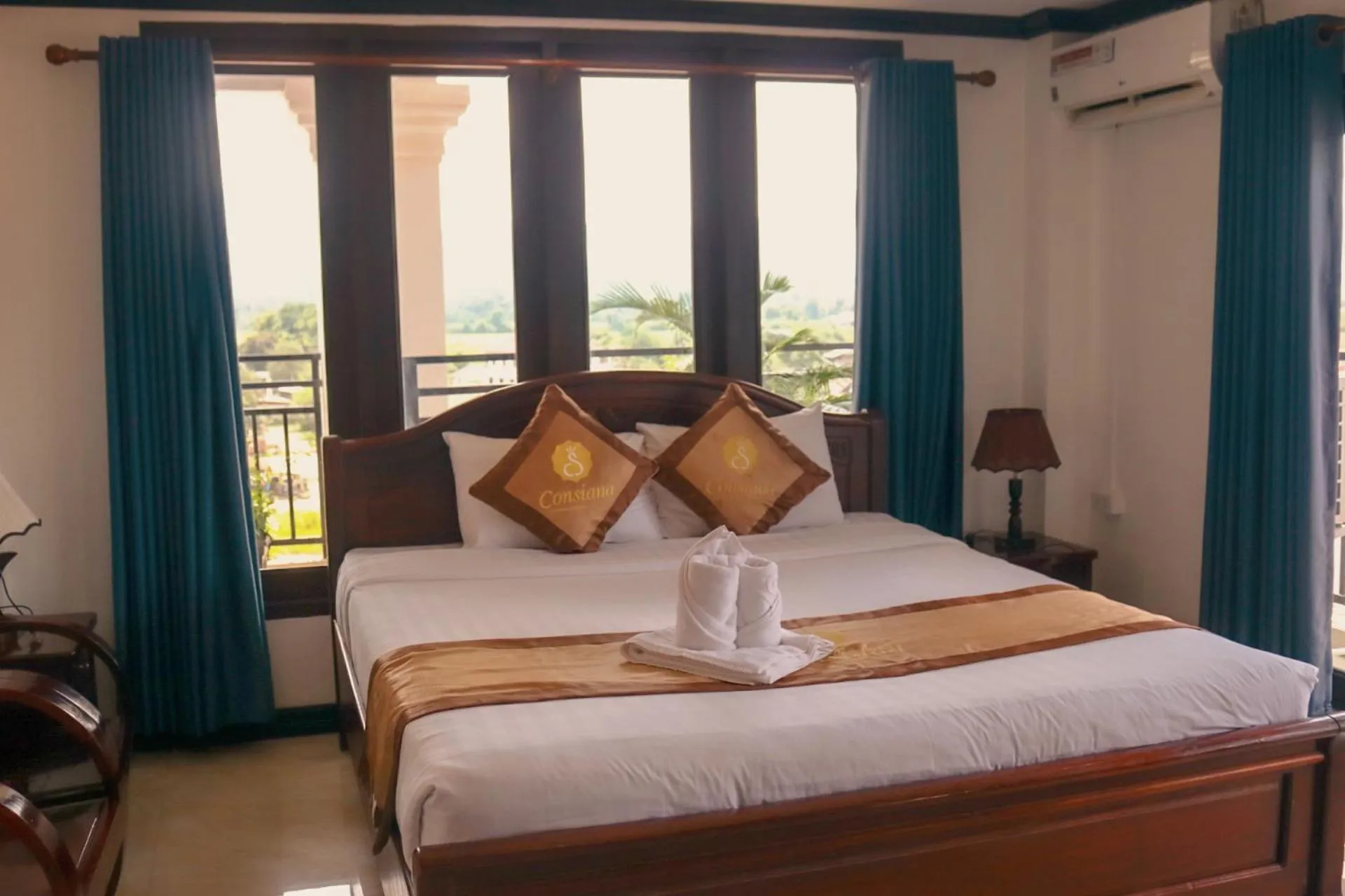 Photo of the whole room, Bed in Vang Vieng Consiana Hotel