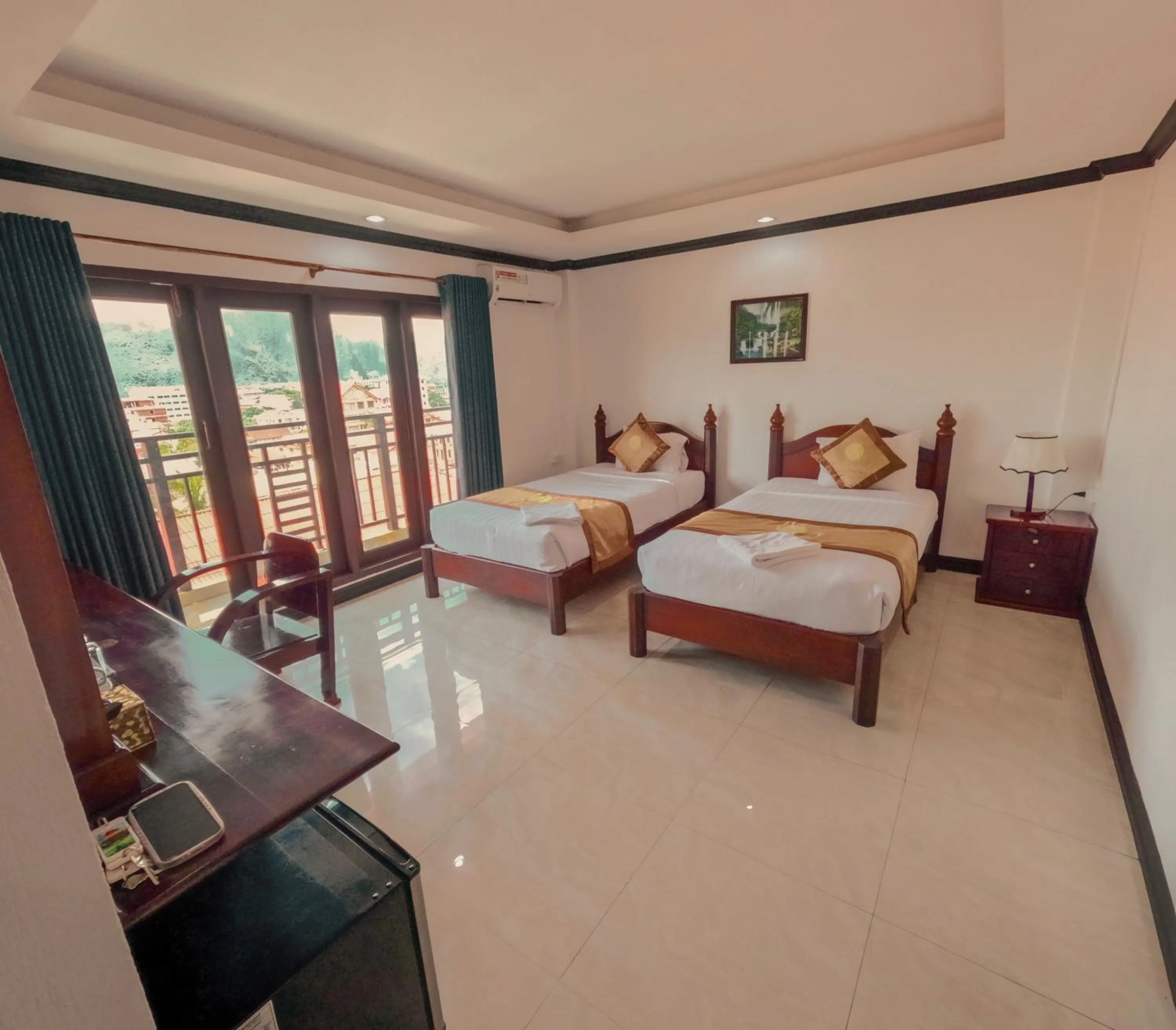 Bedroom, Bed in Vang Vieng Consiana Hotel