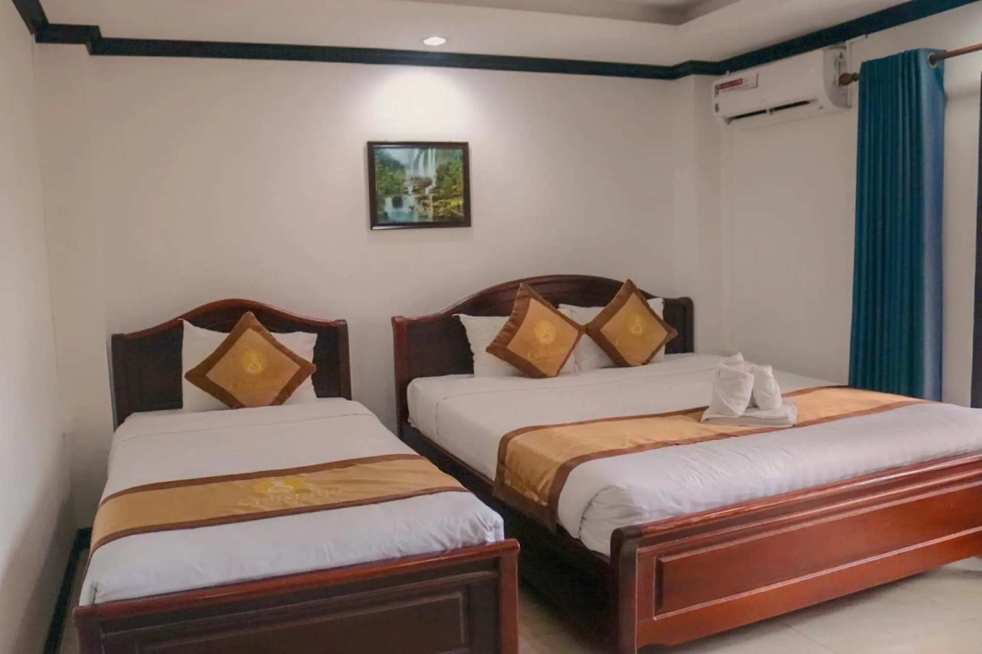air conditioner, Bed in Vang Vieng Consiana Hotel
