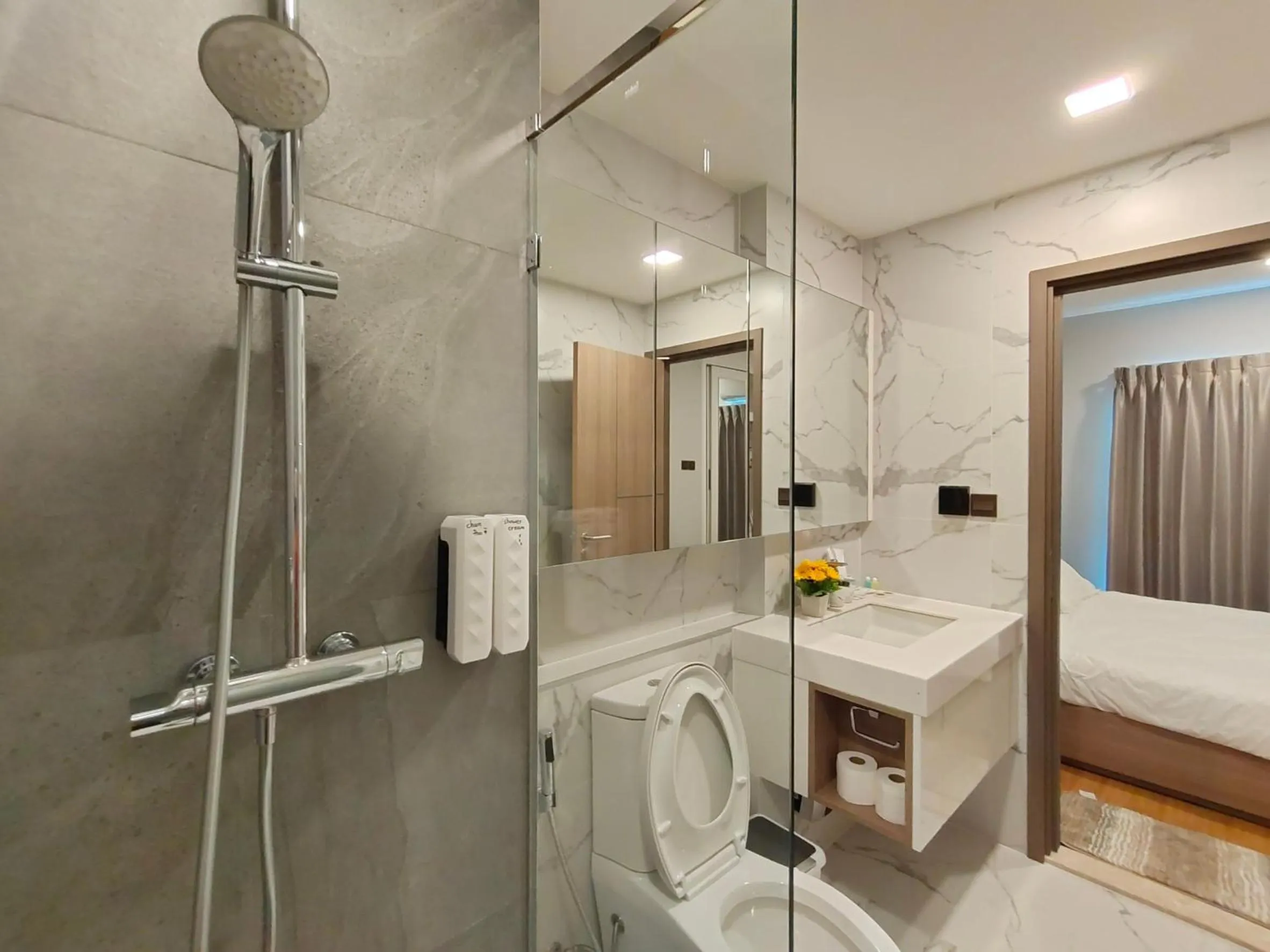 Shower in Astra Sky River Chiang Mai by Fang