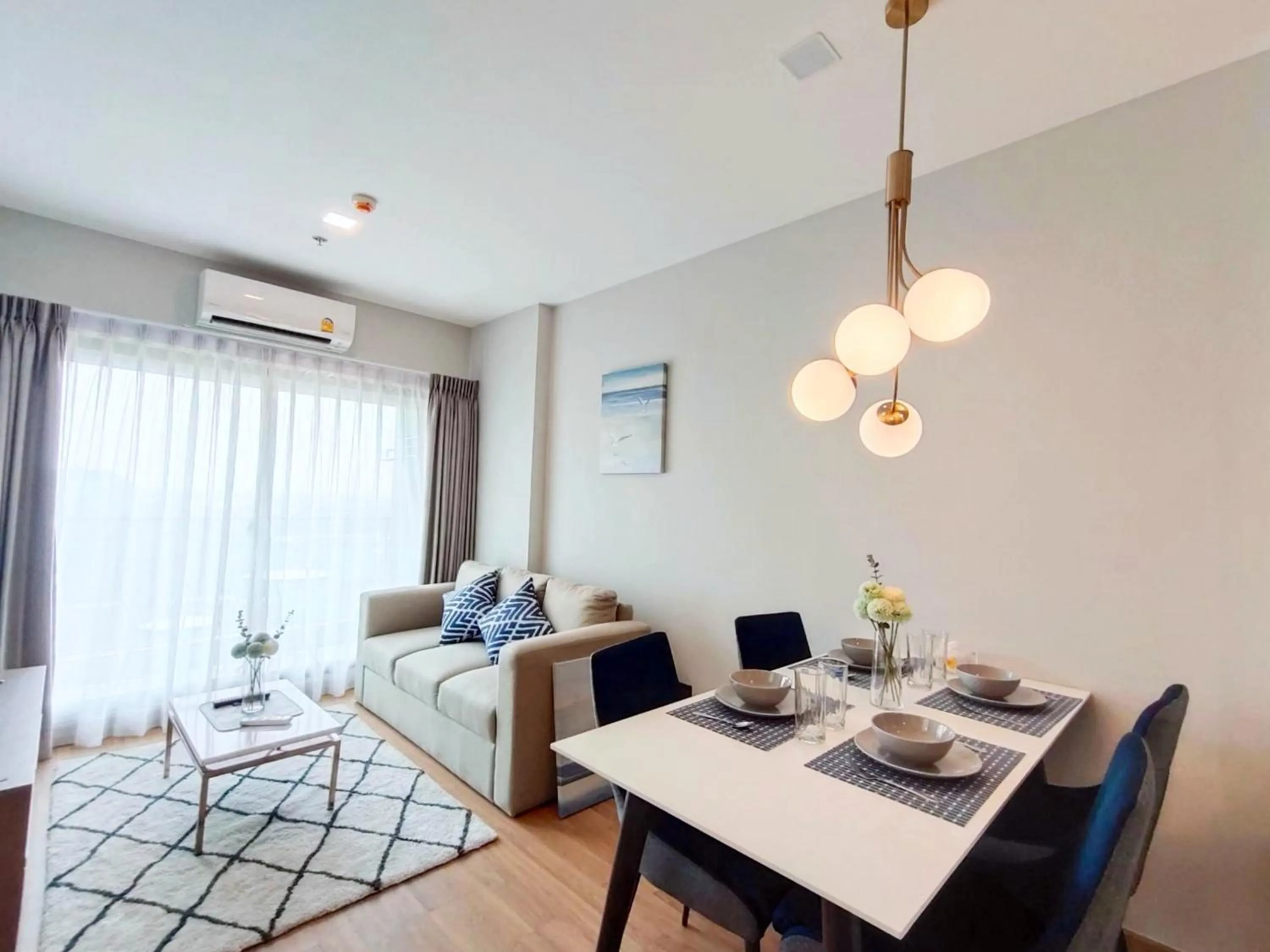 Living room in Astra Sky River Chiang Mai by Fang