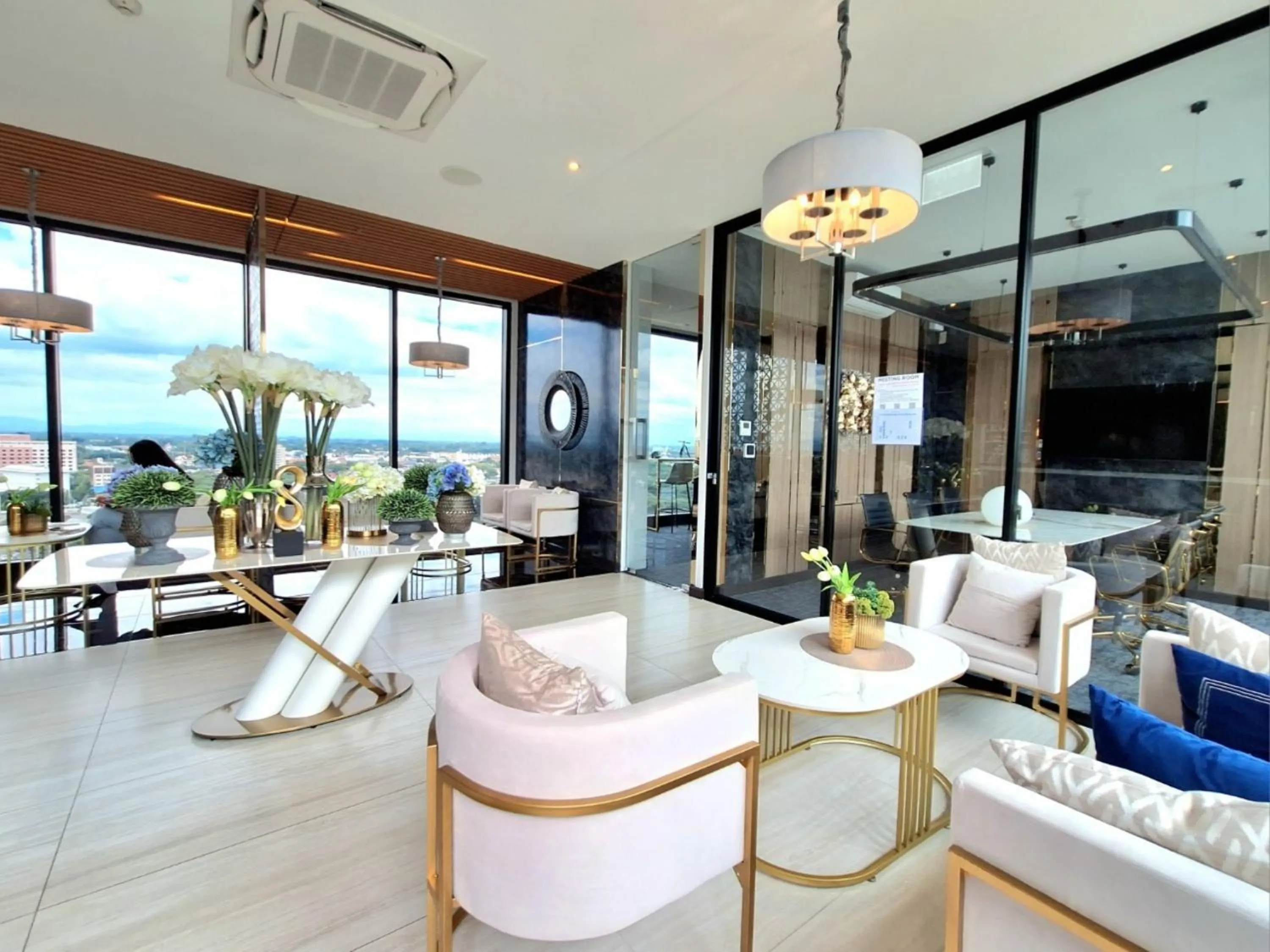 Communal lounge/ TV room in Astra Sky River Chiang Mai by Fang