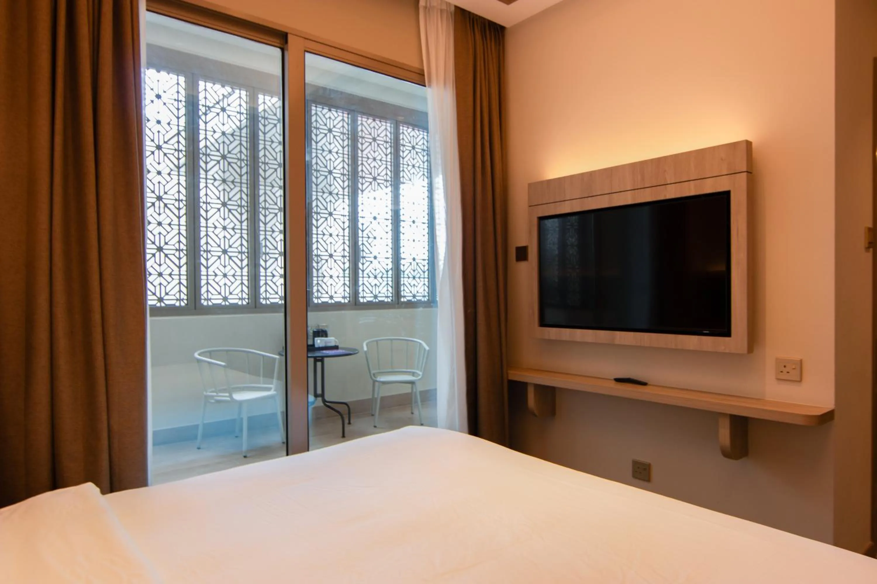 Bed in Aqueen Prestige Hotel Jalan Besar