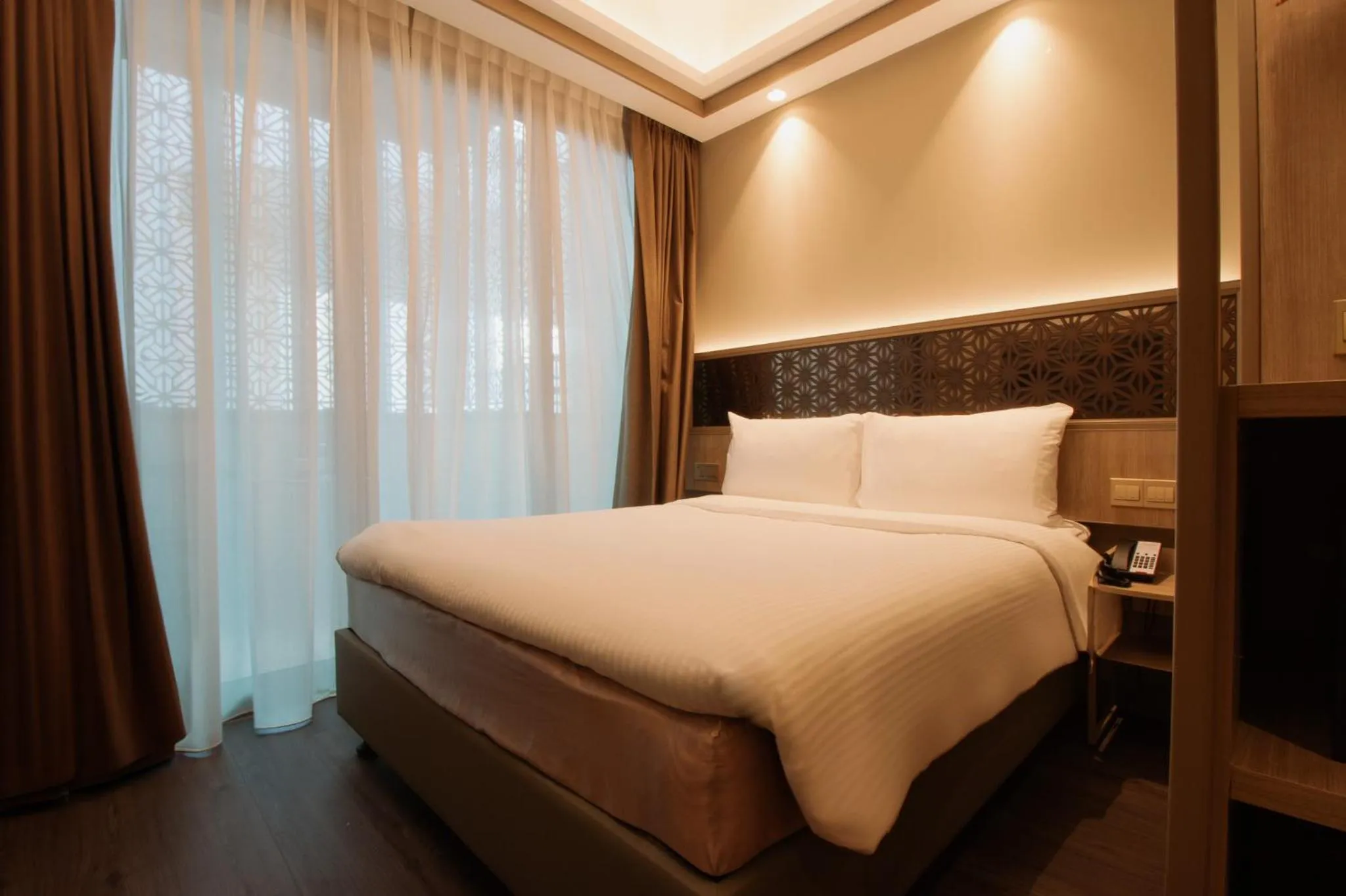 Bed in Aqueen Prestige Hotel Jalan Besar