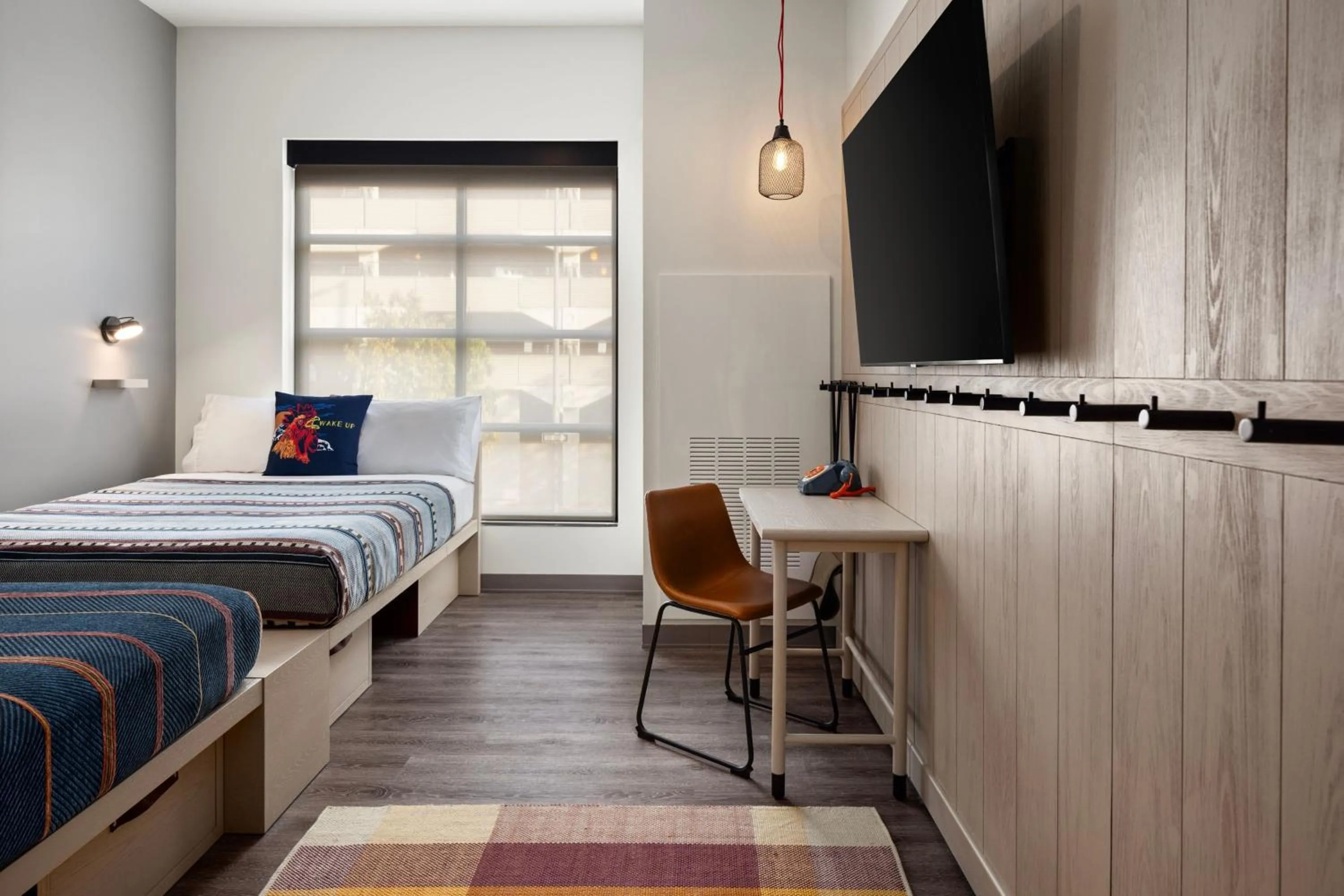 Photo of the whole room, Bed in Moxy Omaha Downtown