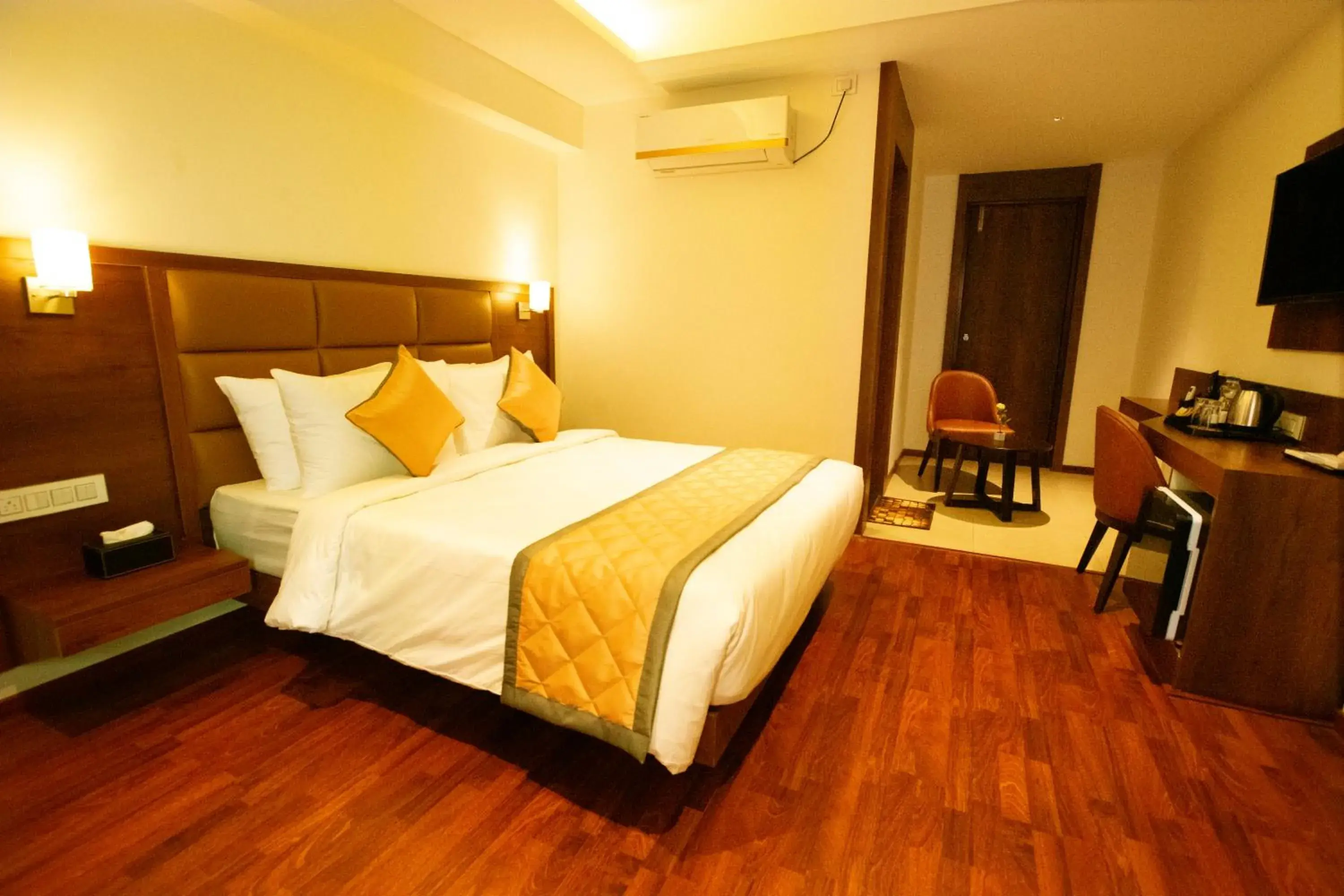 Bed in Golden Fortune Inn Hotel Bed in Golden Fortune Inn Hotel