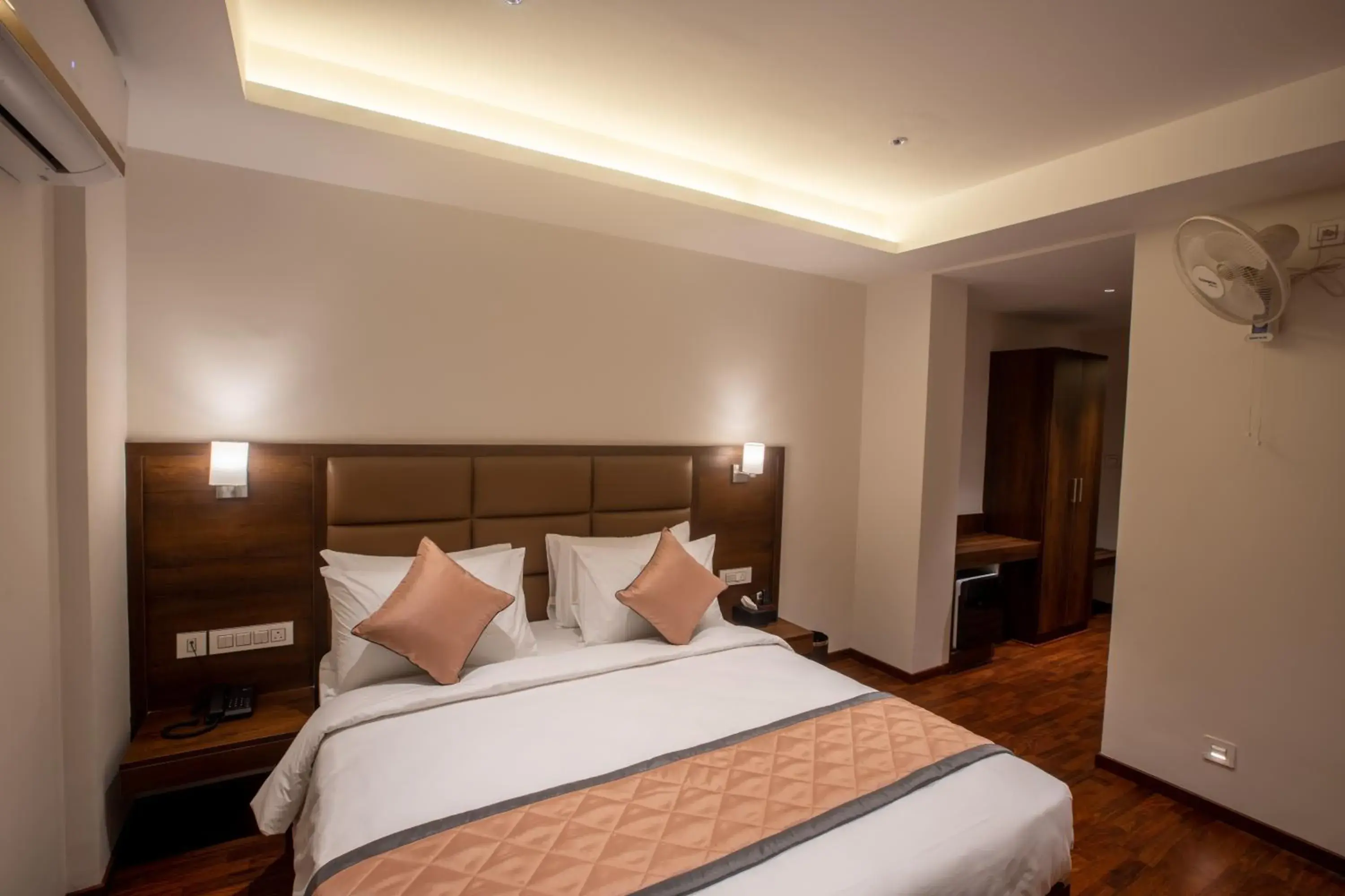 Bed in Golden Fortune Inn Hotel Bed in Golden Fortune Inn Hotel