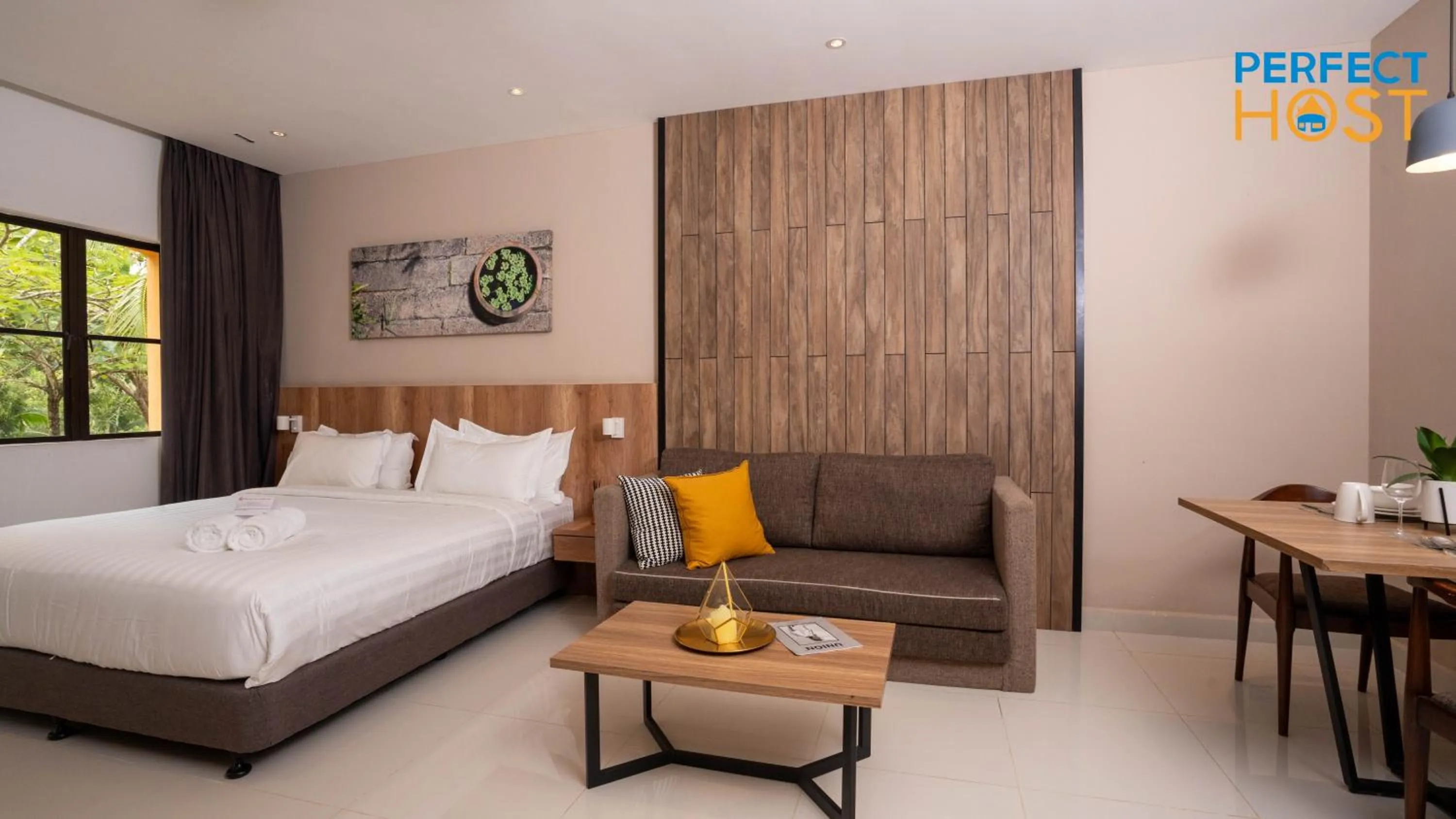 Seating area in Damai Laut Escape by Perfect Host