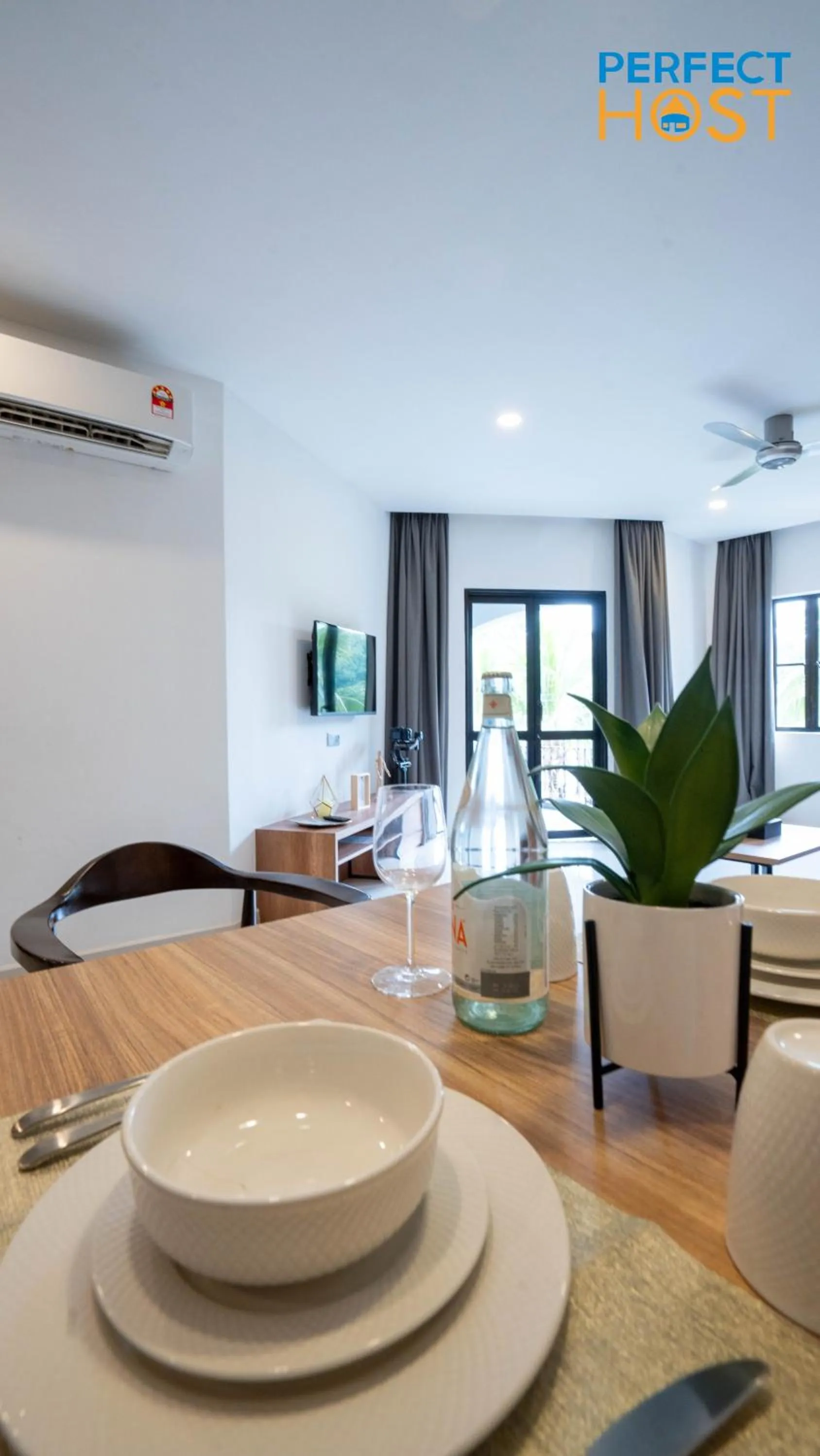 Living room in Damai Laut Escape by Perfect Host