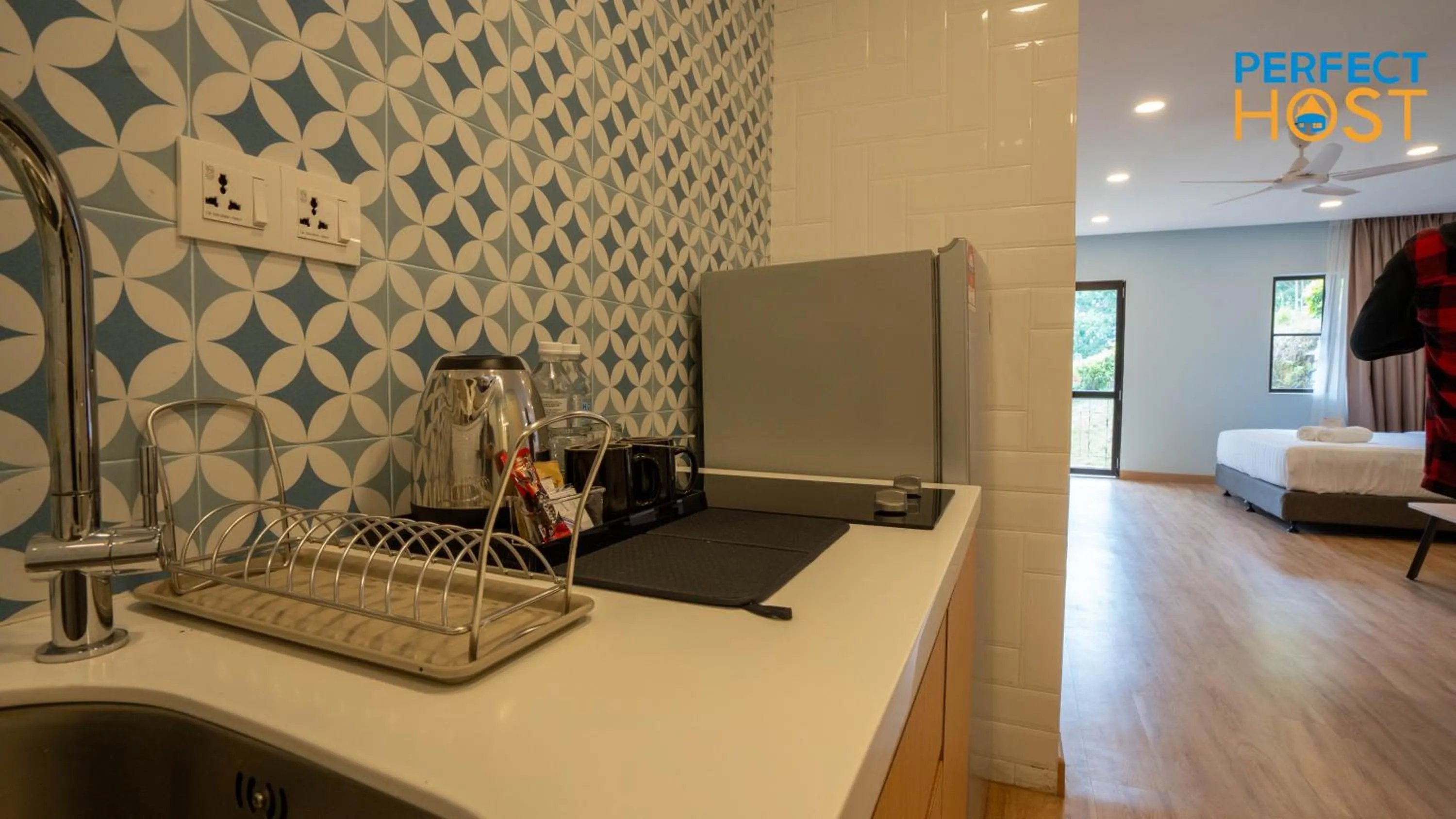 Kitchen or kitchenette in Damai Laut Escape by Perfect Host