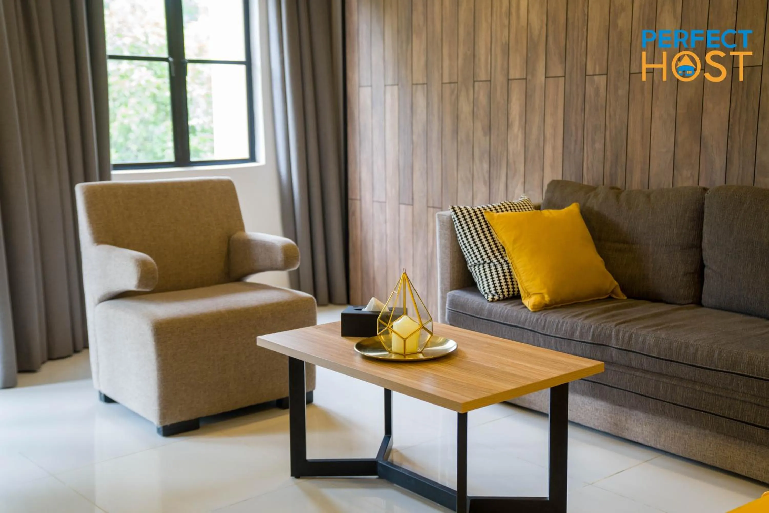 Living room in Damai Laut Escape by Perfect Host